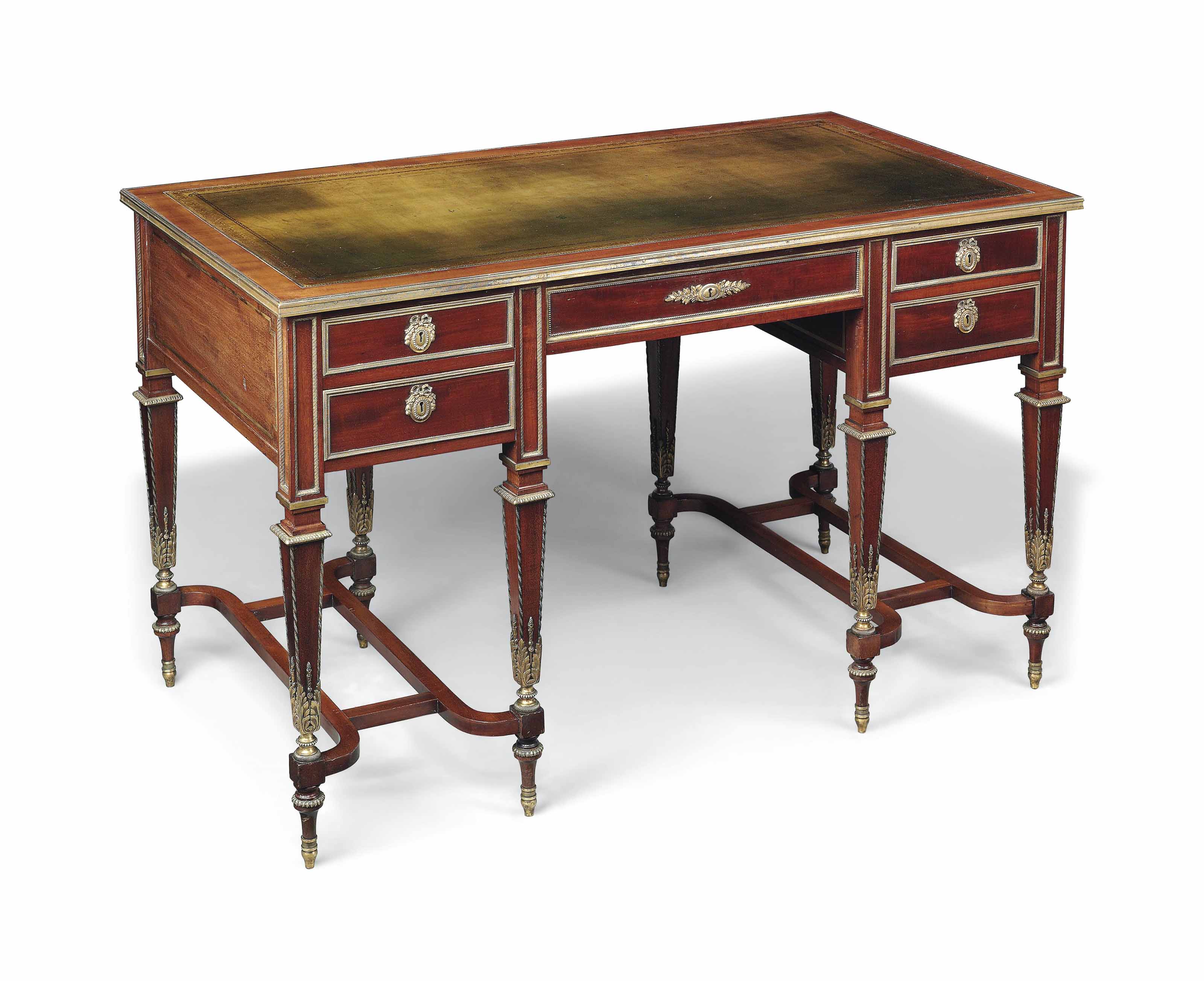 A VICTORIAN GILTBRASS MOUNTED AND BRASSINLAID MAHOGANY DESK , BY