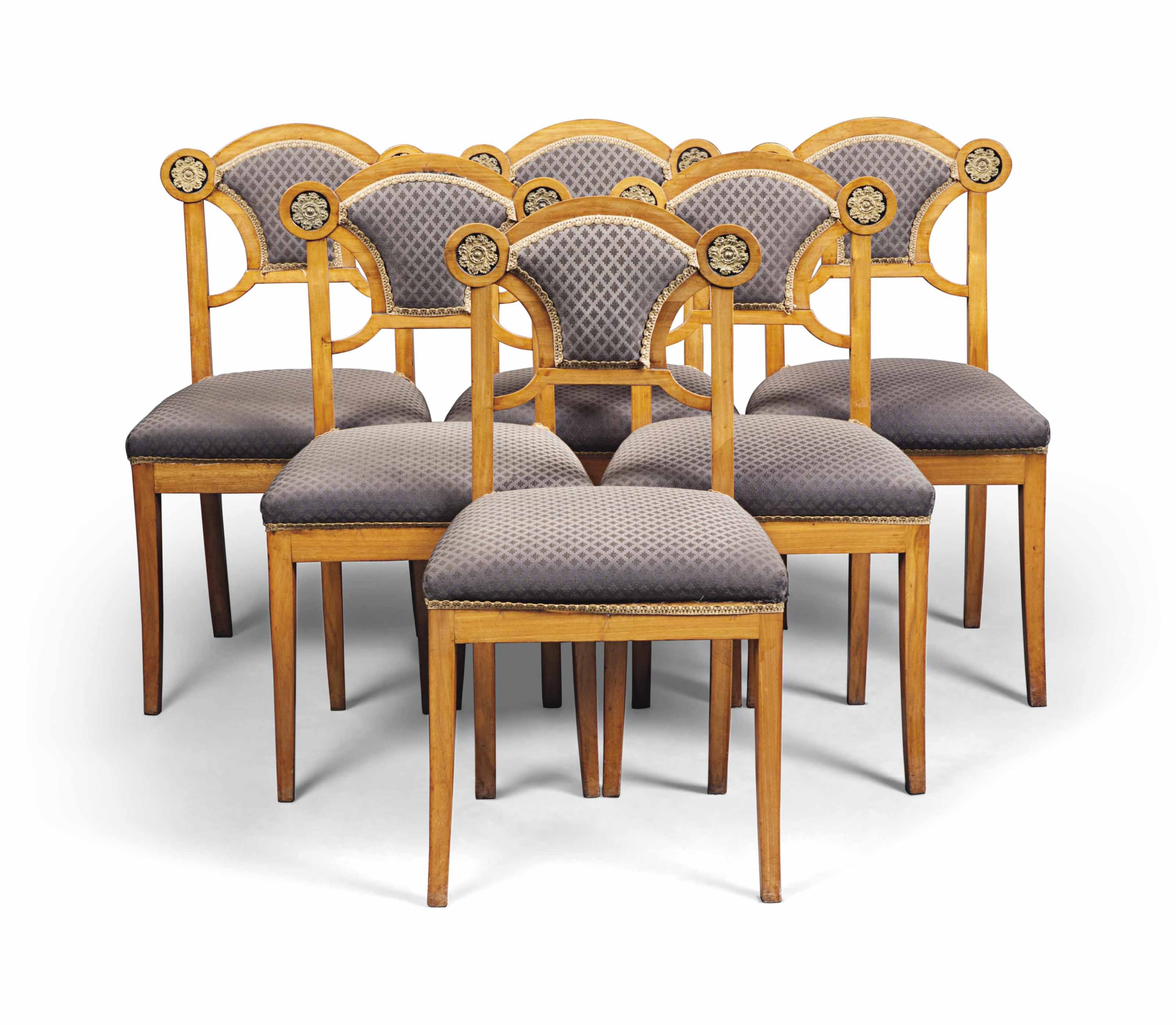A SET OF SIX BIEDERMEIER STYLE BIRCH DINING CHAIRS