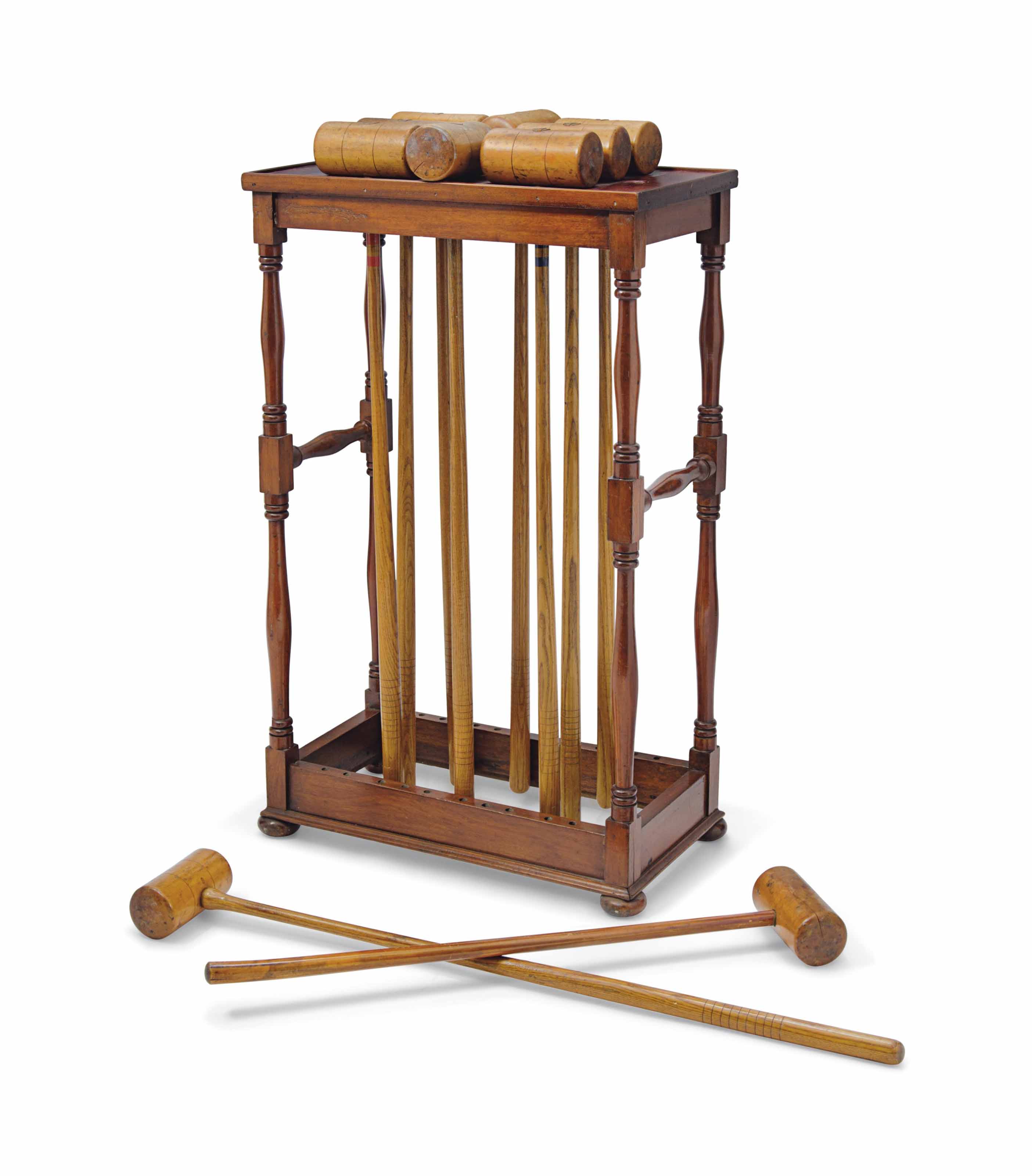 A VICTORIAN CROQUET SET ON STAND , CIRCA 1870 Christie's