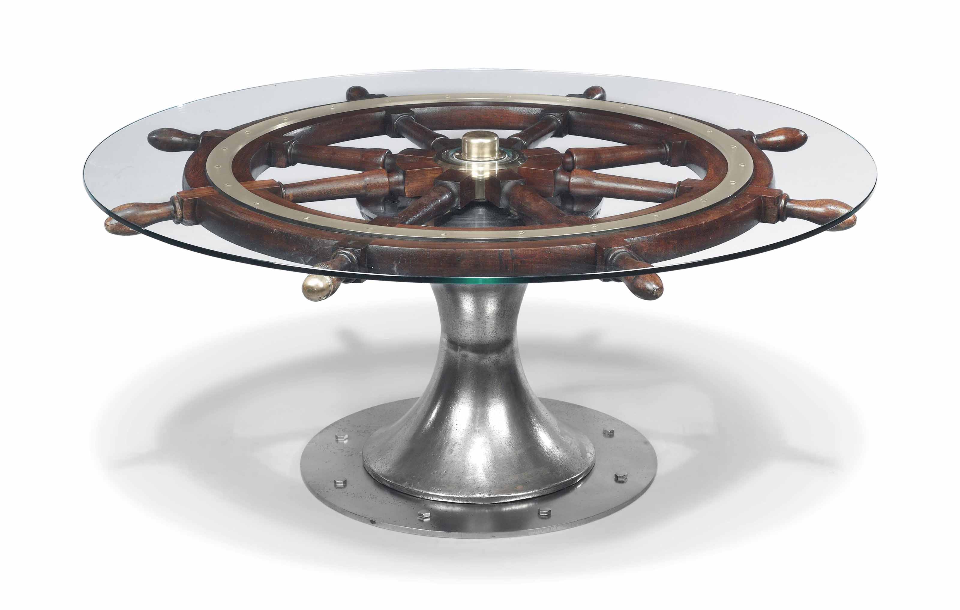 A NOVELTY TEAK SHIP'S WHEEL COFFEE TABLE , EARLY 20TH CENTURY AND ADAPTED Christie's