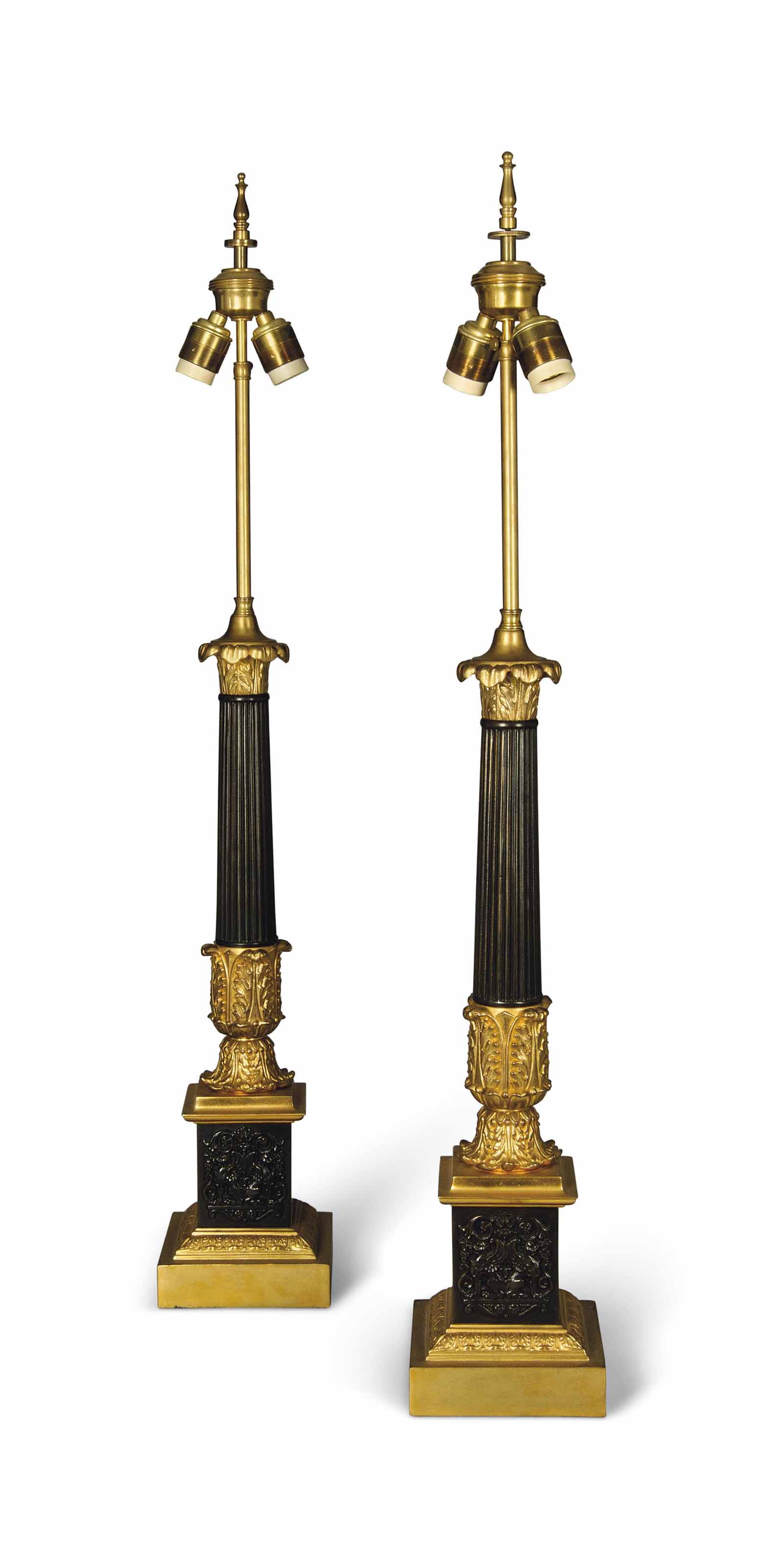A LARGE PAIR OF FRENCH GILT AND PATINATED BRONZE COLUMN ...