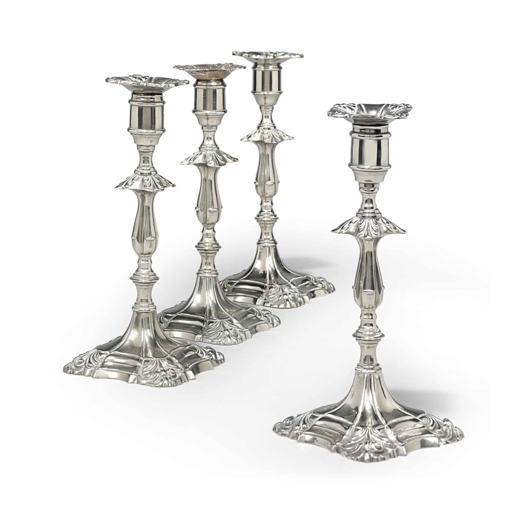 A SET OF FOUR PAKTONGSTYLE 'GERMANSILVER' CANDLESTICKS, 19TH CENTURY