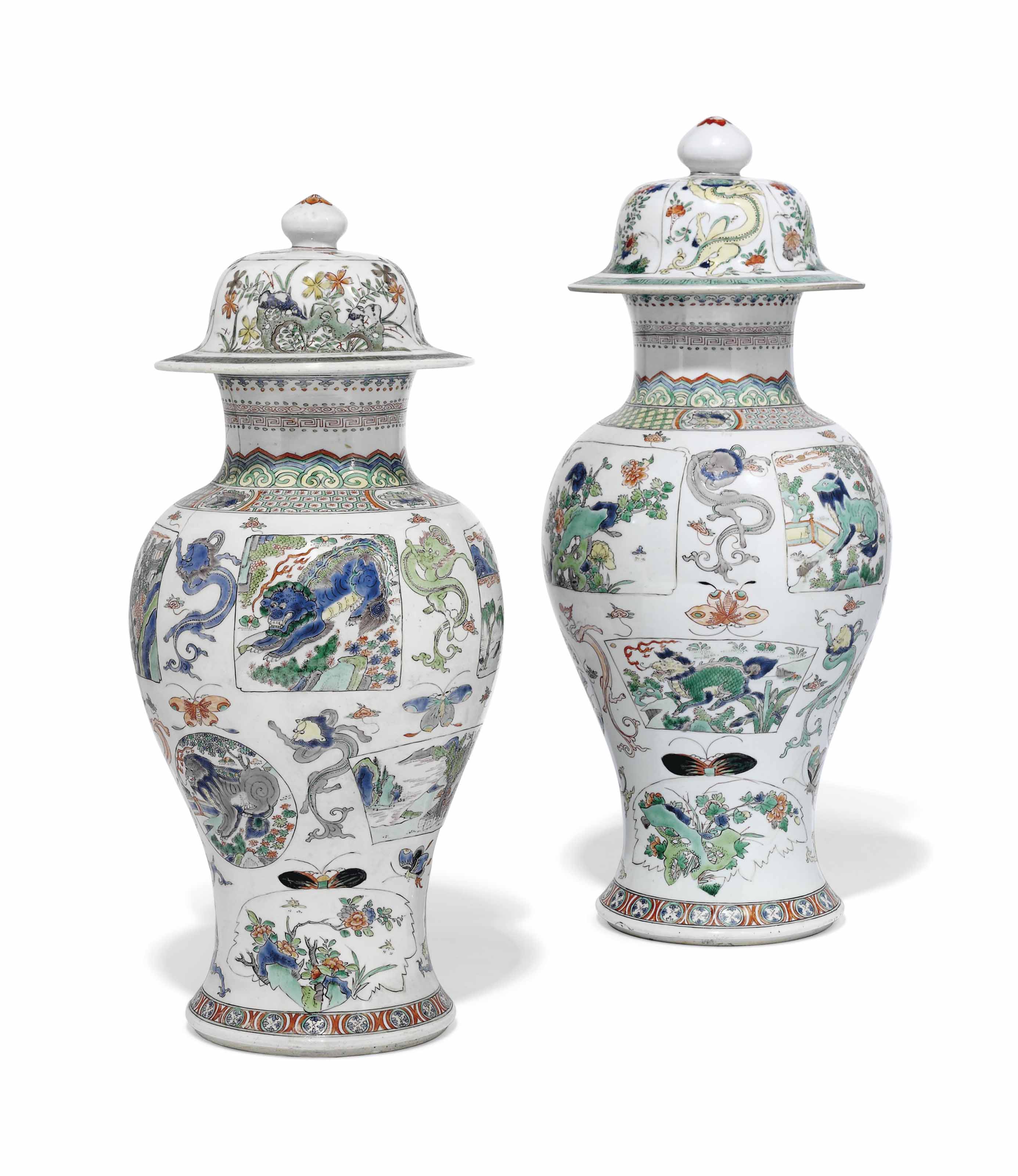 A MATCHED PAIR OF CHINESE FAMILLE VERTE VASES AND COVERS