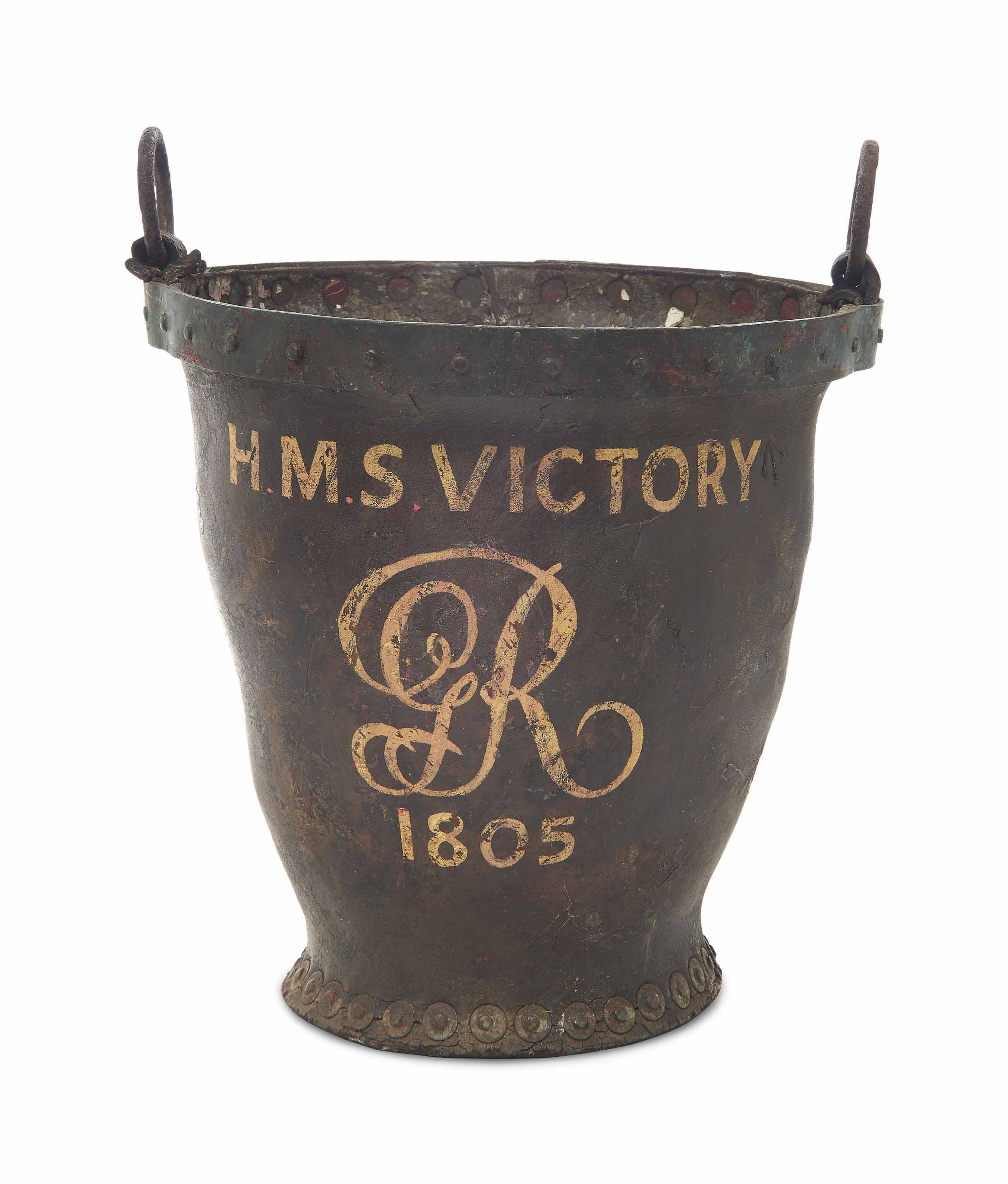 A PAINTED LEATHER FIRE BUCKET FROM H.M.S. VICTORY , DATED '1805