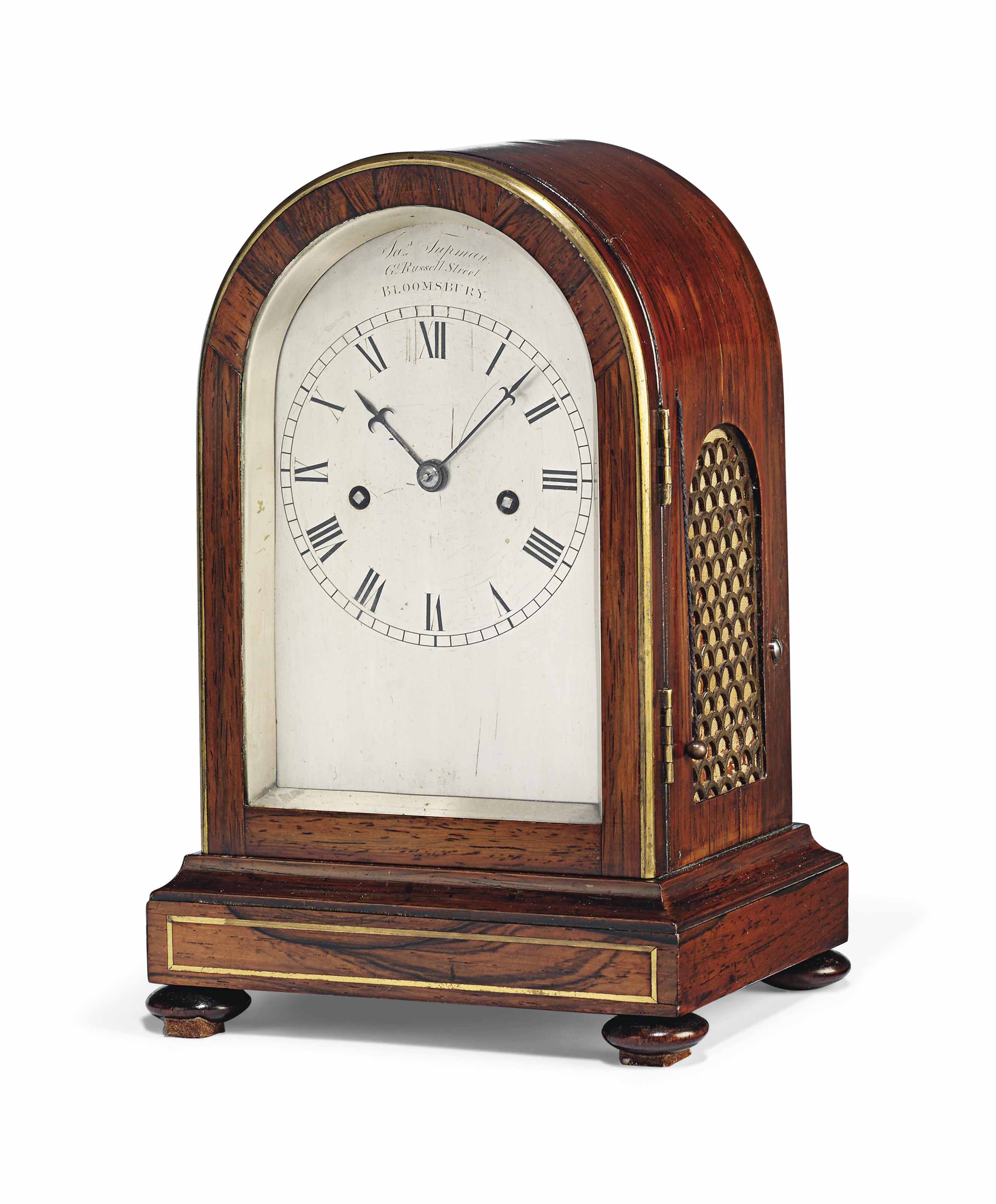 A REGENCY BRASSINLAID ROSEWOOD SMALL STRIKING MANTEL CLOCK