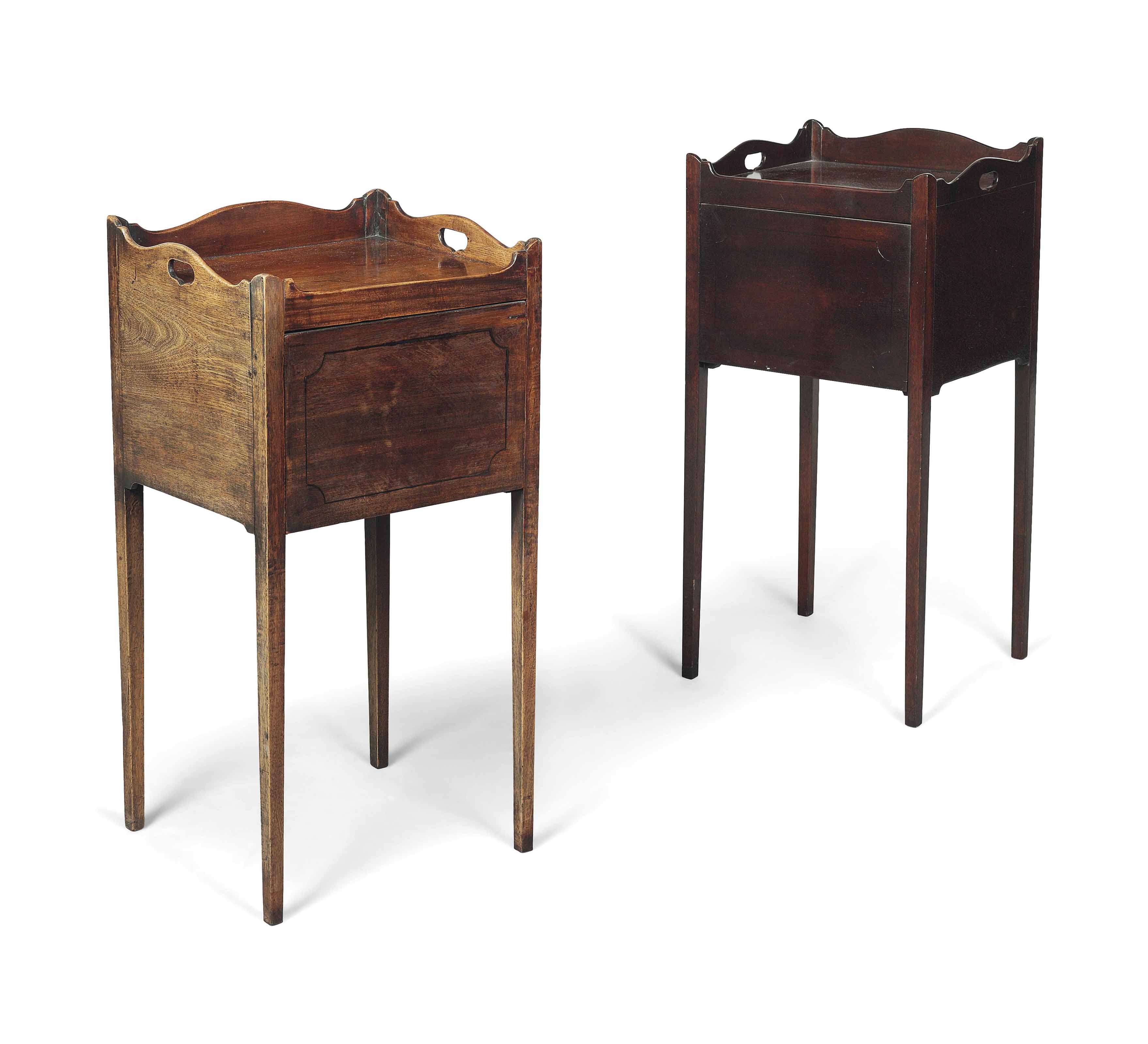 A MATCHED PAIR OF ENGLISH MAHOGANY BEDSIDE TABLES