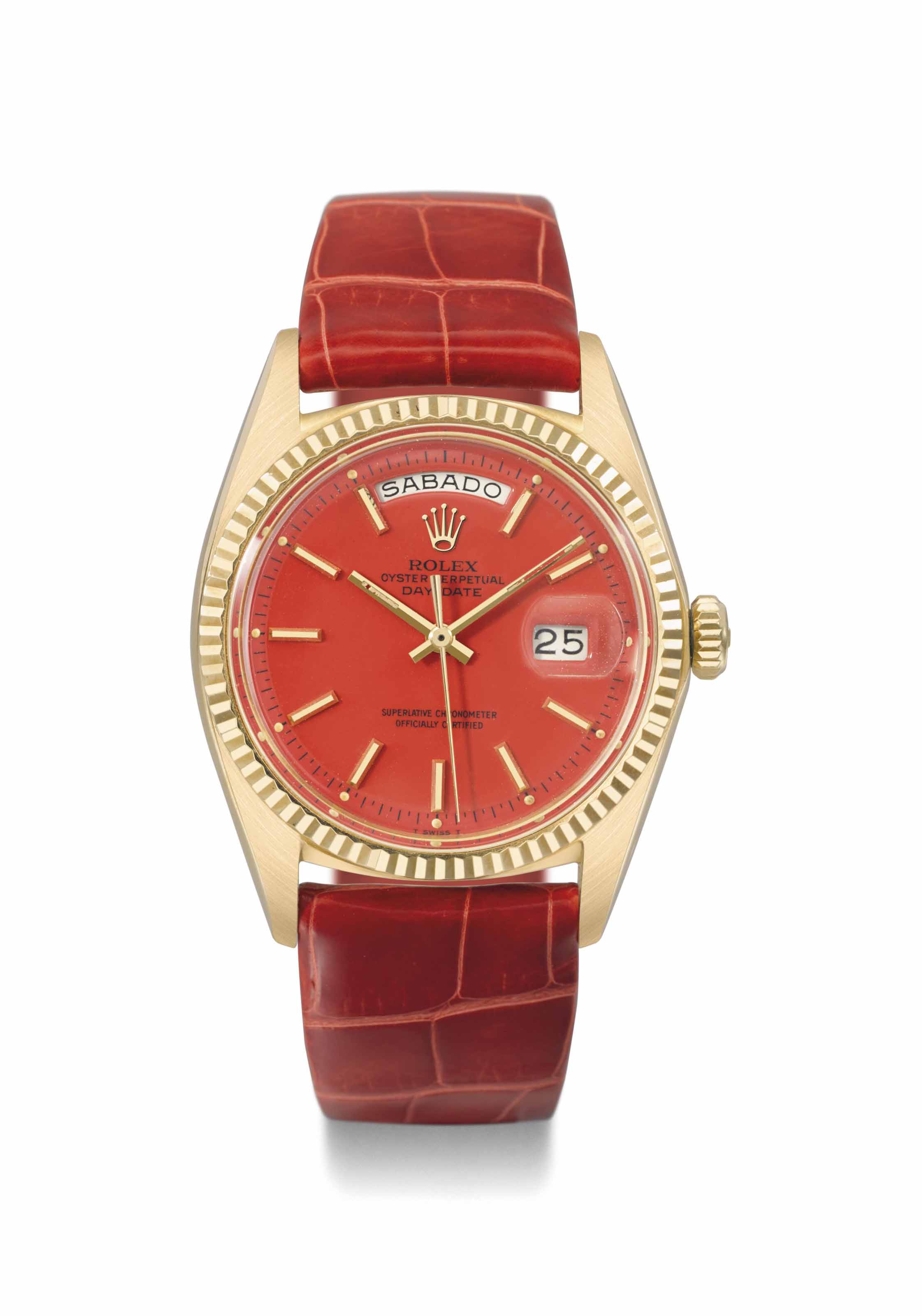 Rolex. A very fine and rare 18K gold automatic calendar wristwatch with
