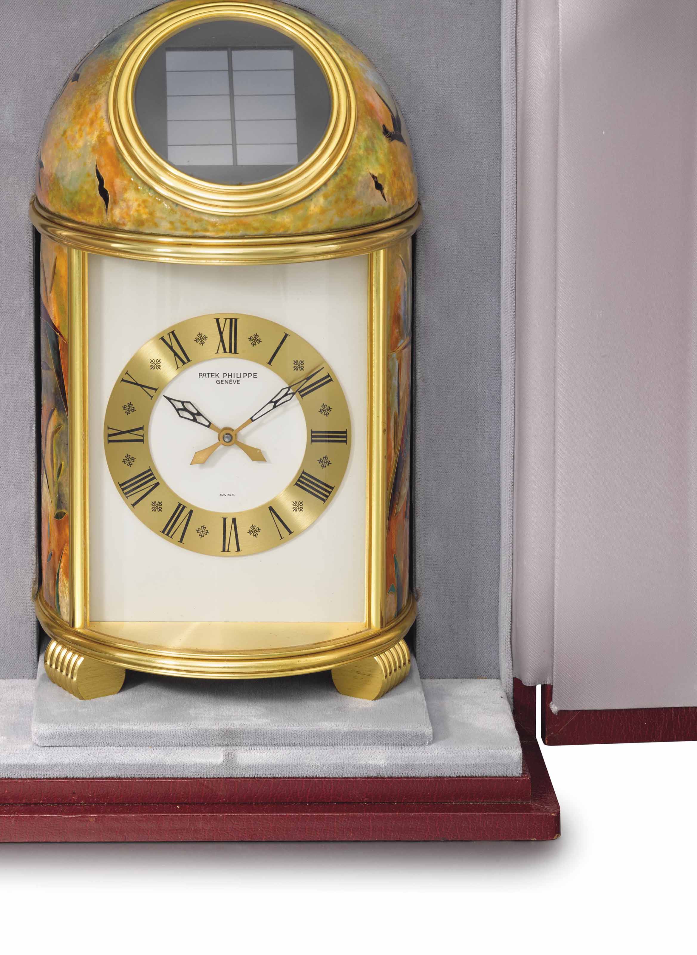 Patek Philippe. A very fine and unique gilt brass solarpowered dome