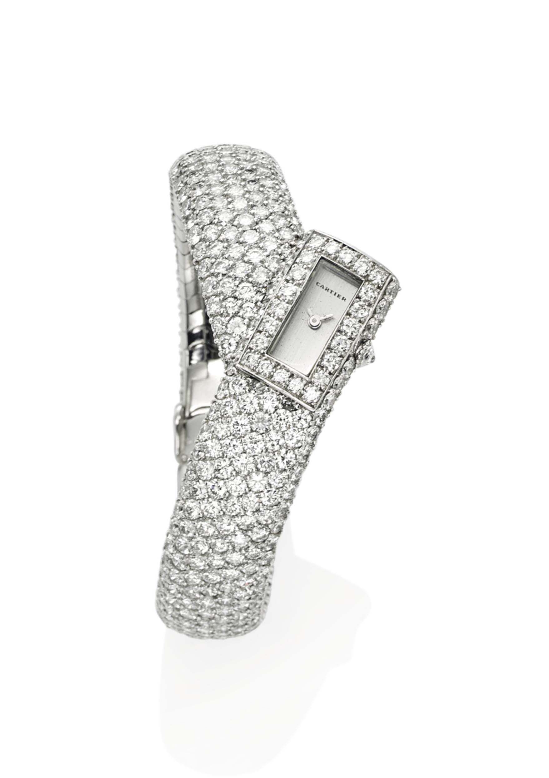 A DIAMOND BRACELETWATCH, BY CARTIER Christie's