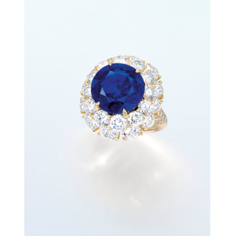 An extremely rare sapphire and diamond ring. A circular-cut sapphire weighing approximately 10.33 carats, set within a brilliant-cut diamond two-tiered surround, mounted in 18k gold. Sold for HK$19,160,000 on 2 June 2015 at Christie’s in Hong Kong