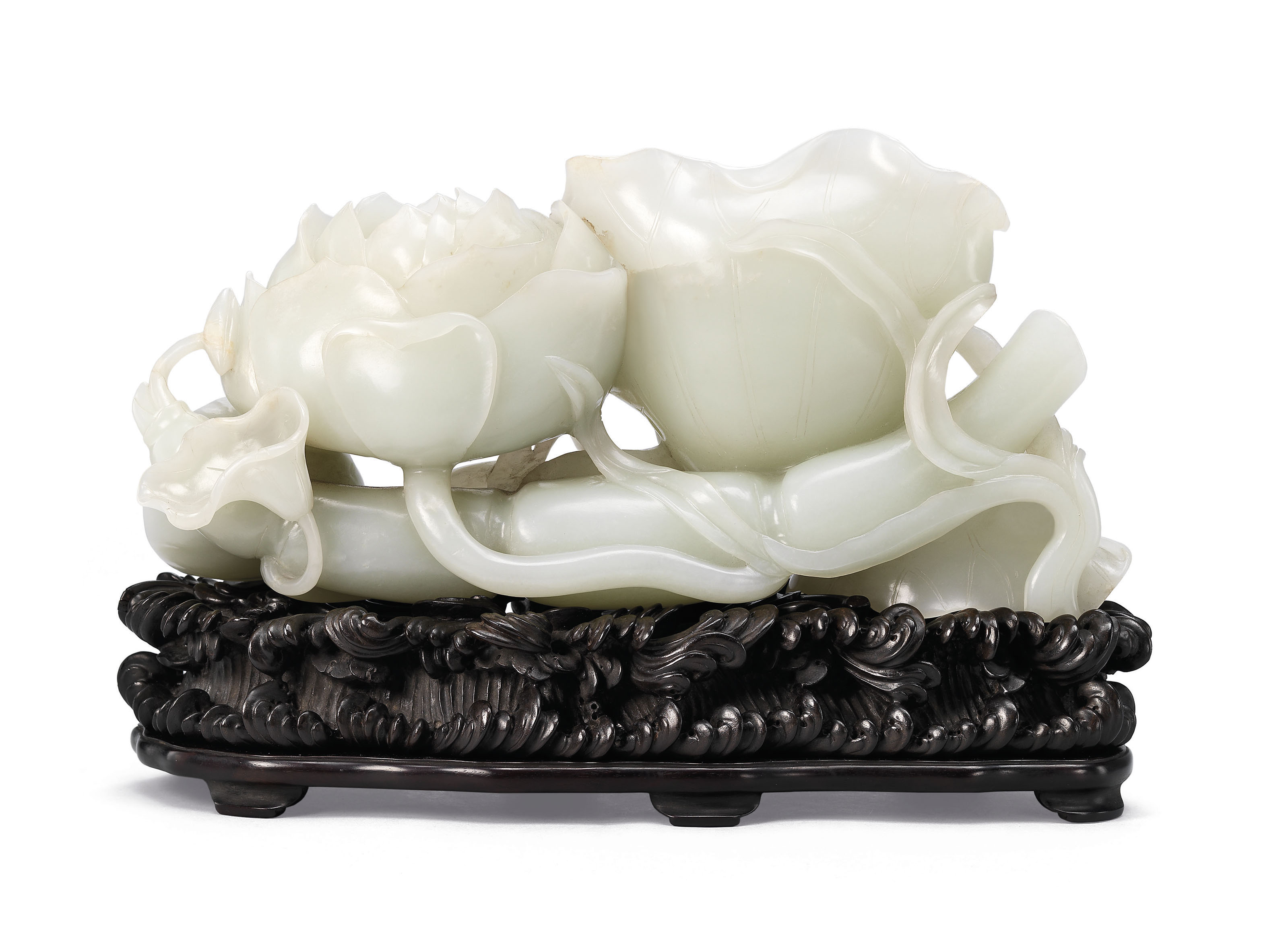 A LARGE WHITE JADE LOTUS GROUP , QING DYNASTY, 18TH CENTURY Christie's