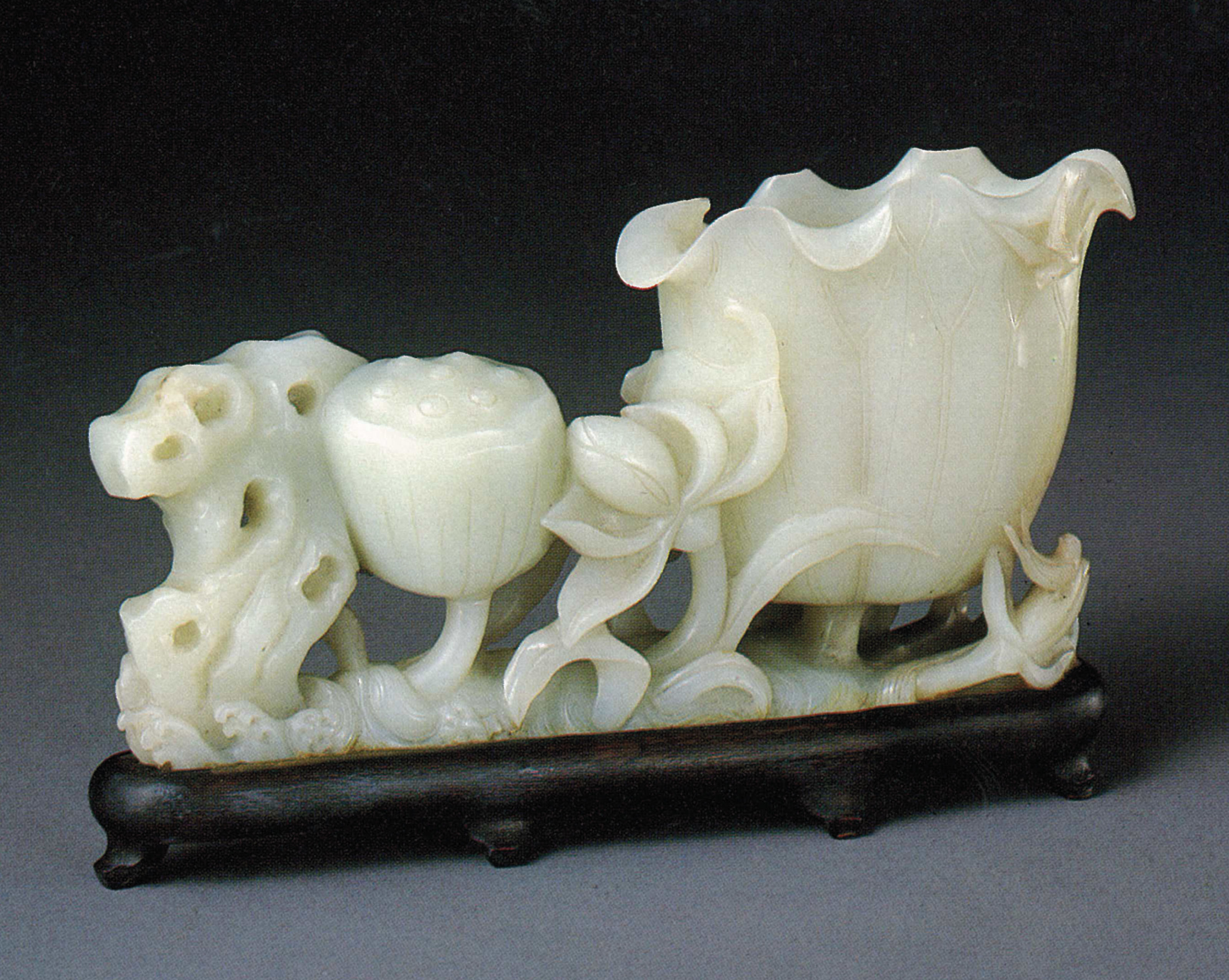 A LARGE WHITE JADE LOTUS GROUP , QING DYNASTY, 18TH CENTURY Christie's