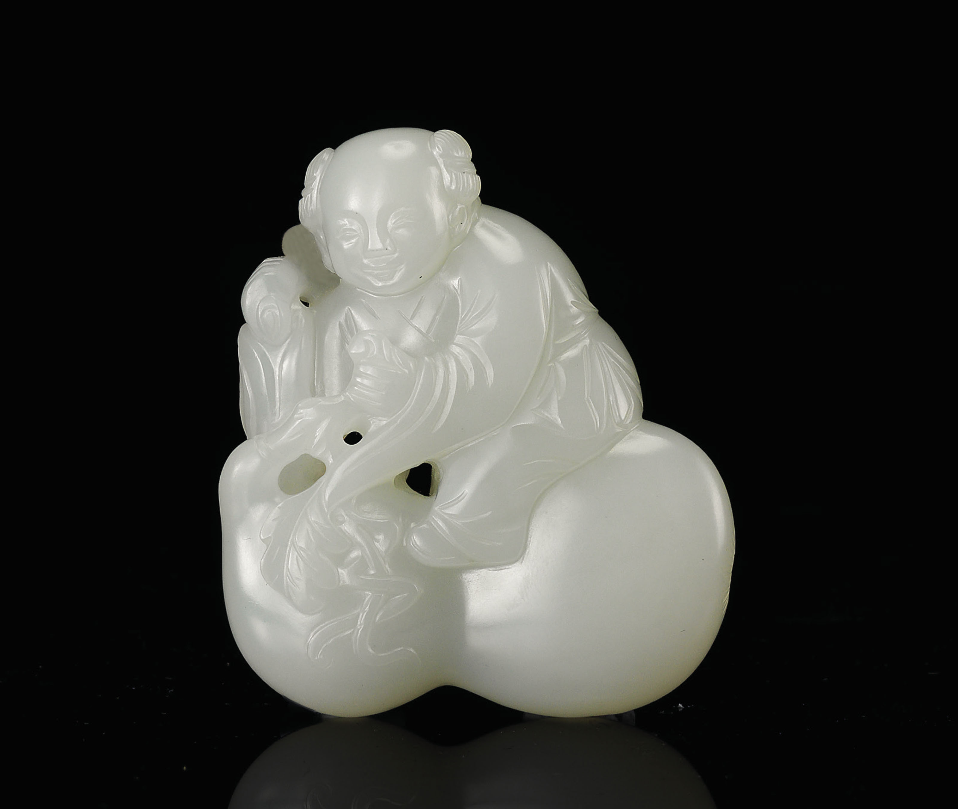 A WHITE JADE 'DOUBLEGOURD AND BOY' PENDANT