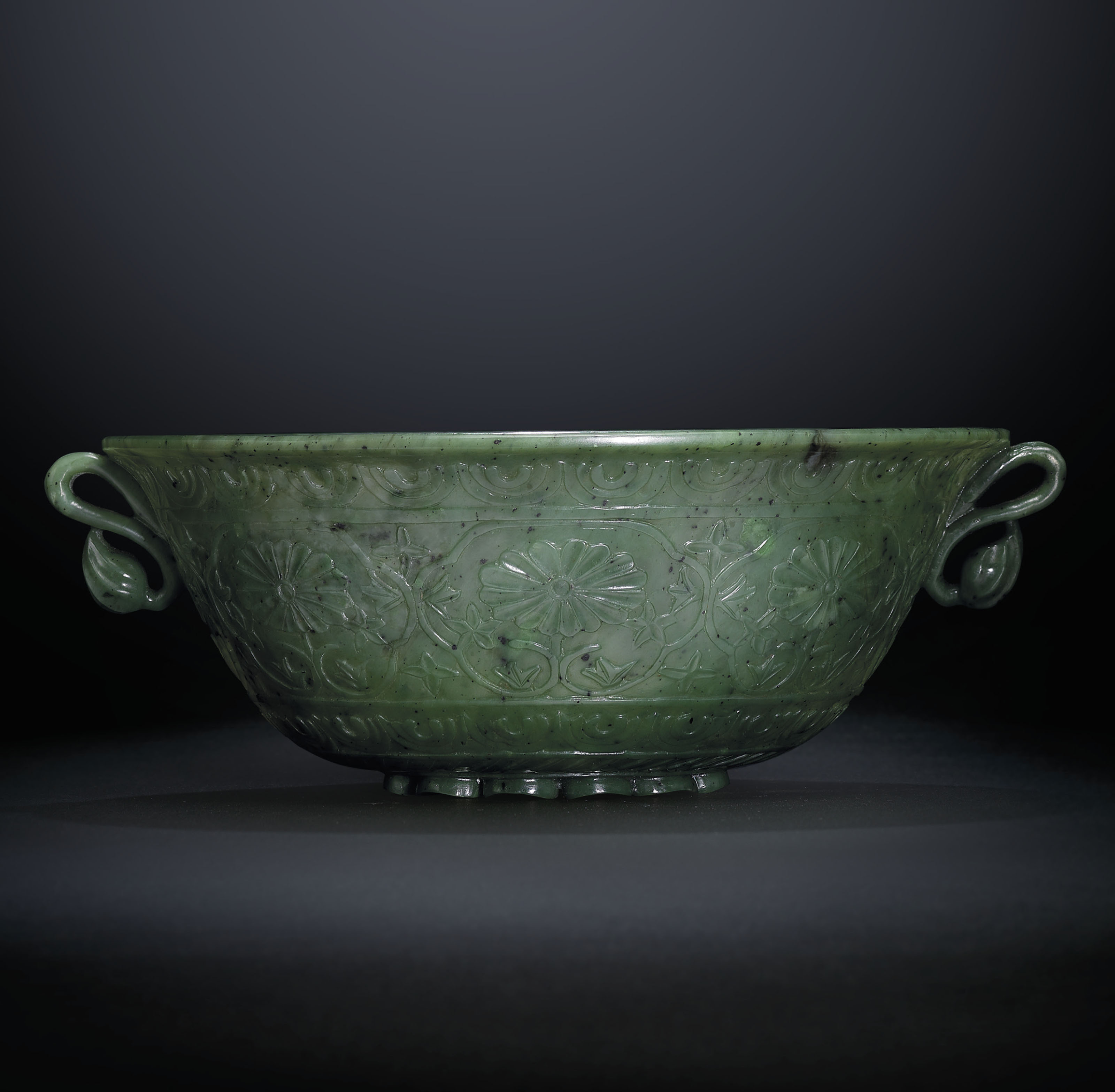 A MUGHALSTYLE SPINACHGREEN JADE 'CHRYSANTHEMUM' BOWL , QING DYNASTY
