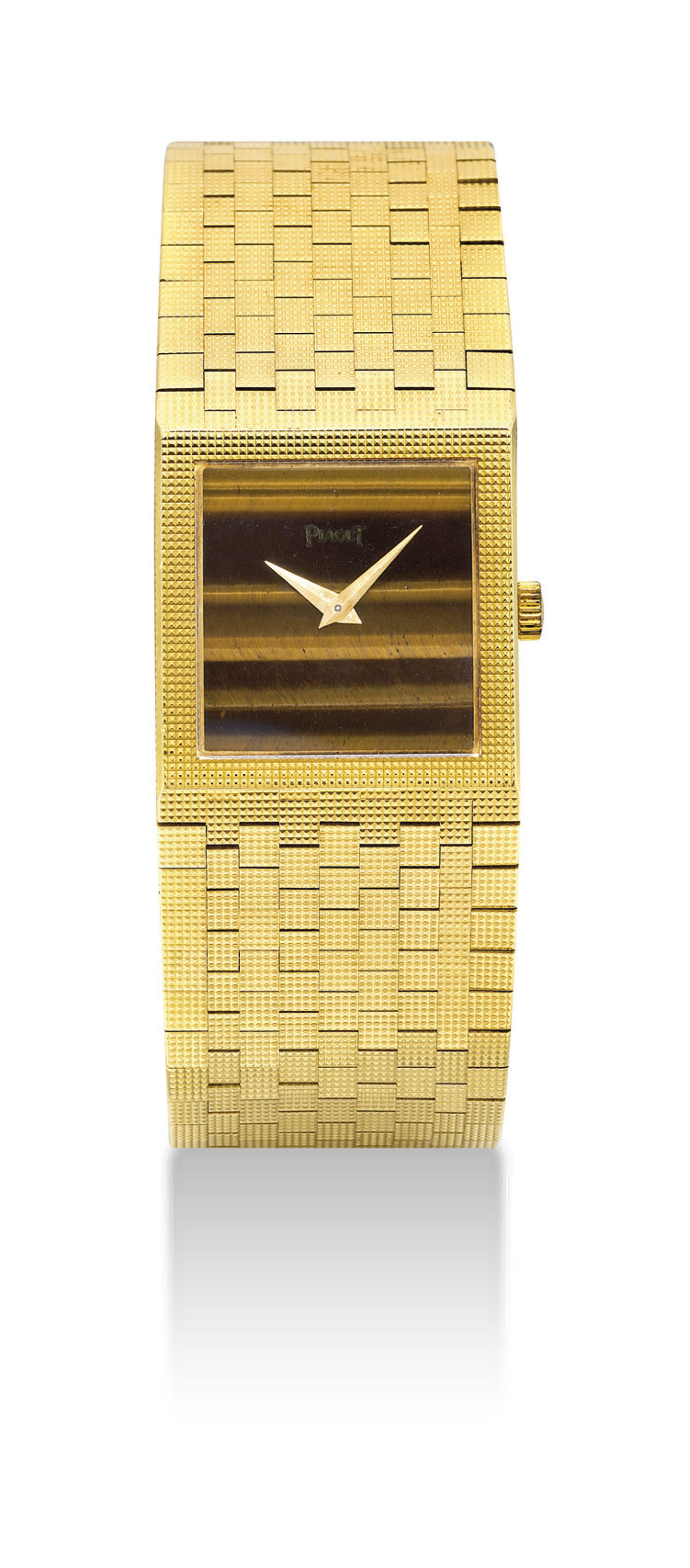 PAIGET. A FINE 18K GOLD SQUARE BRACELET WATCH WITH TIGER’S EYE DIAL, SIGNED PIAGET, REF. 9131 C 4, CASE NO. 297796, CIRCA 1970... 