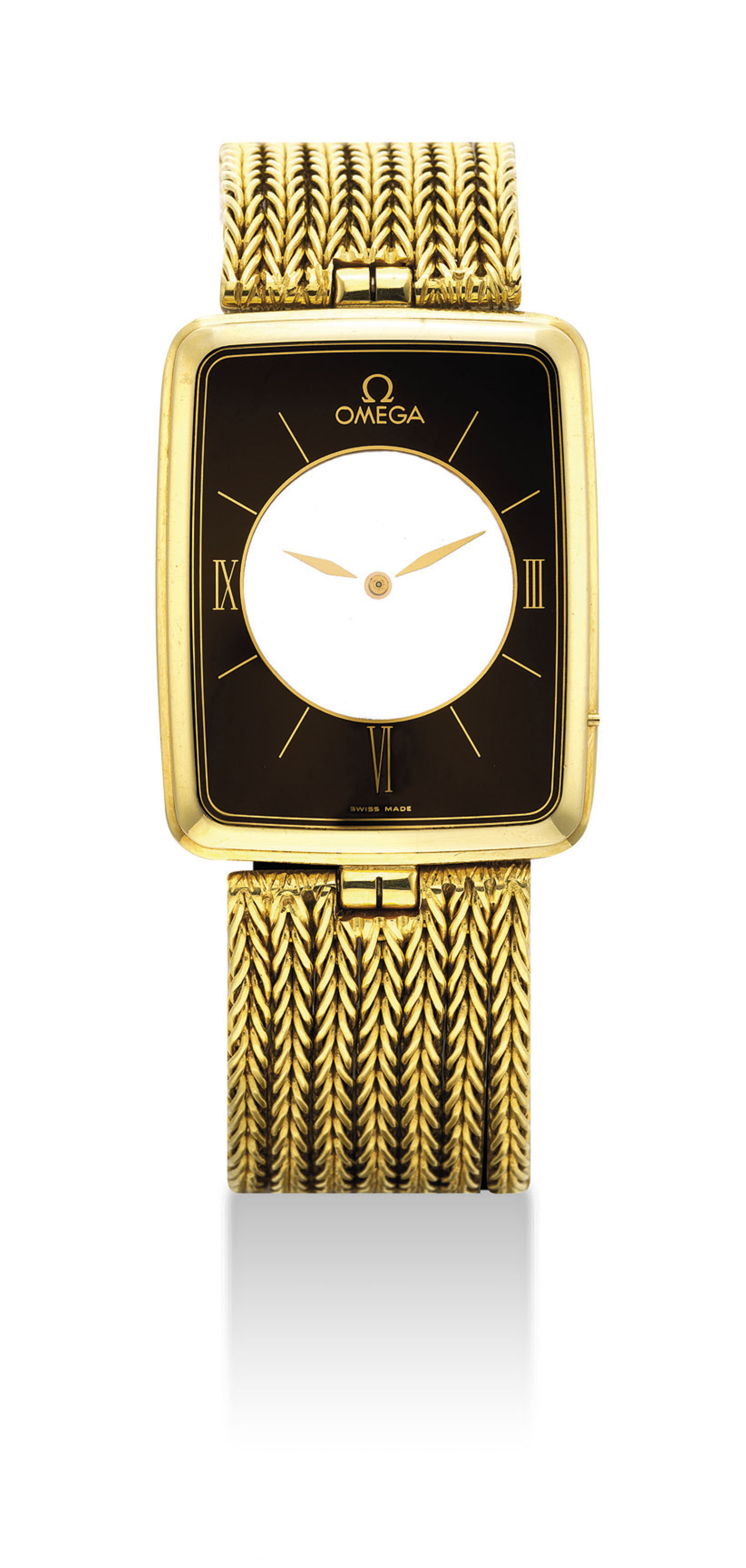 OMEGA. AN UNUSUAL 18K GOLD RECTANGULAR 