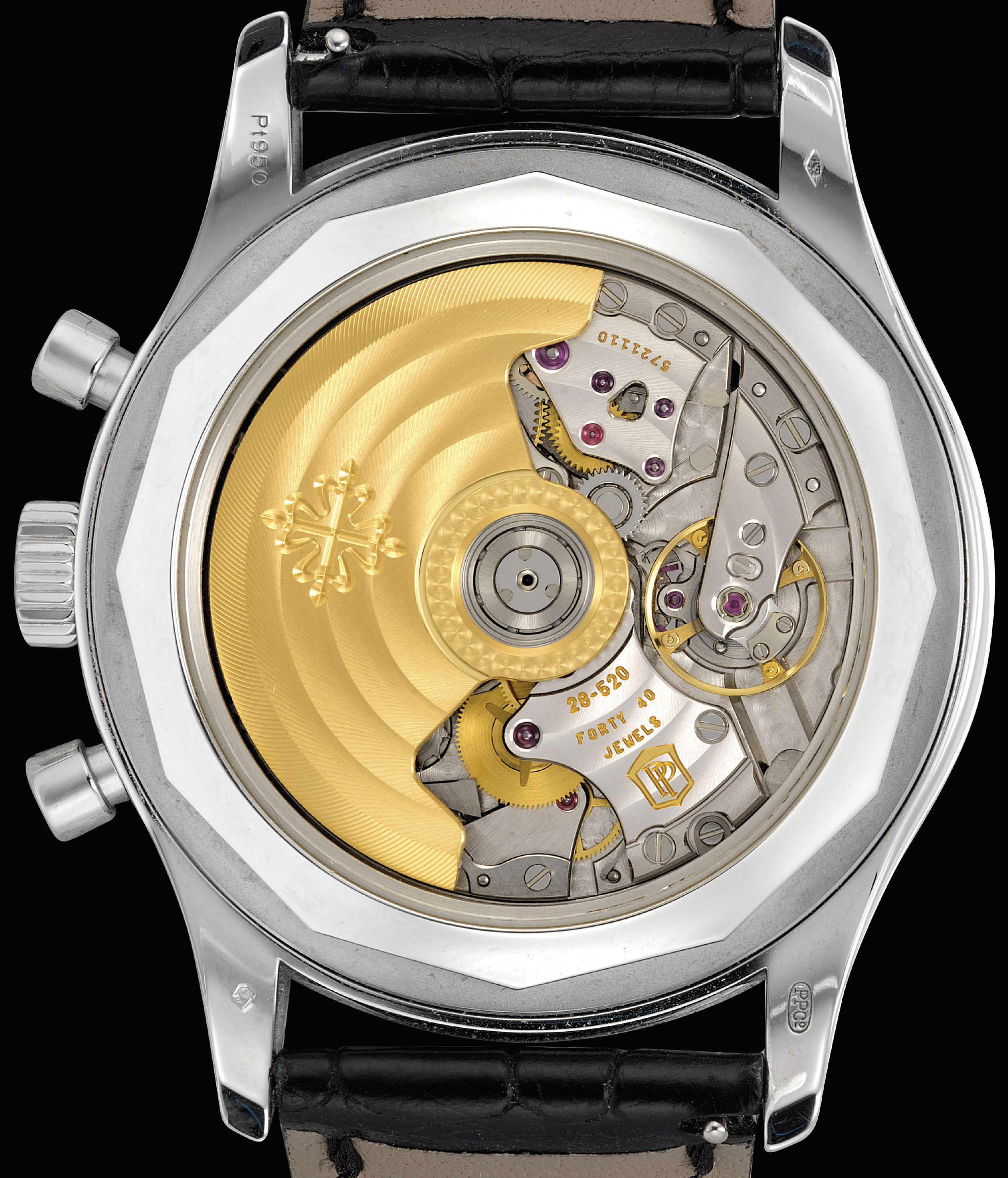 PATEK PHILIPPE A FINE AND RARE PLATINUM AUTOMATIC ANNUAL CALENDAR