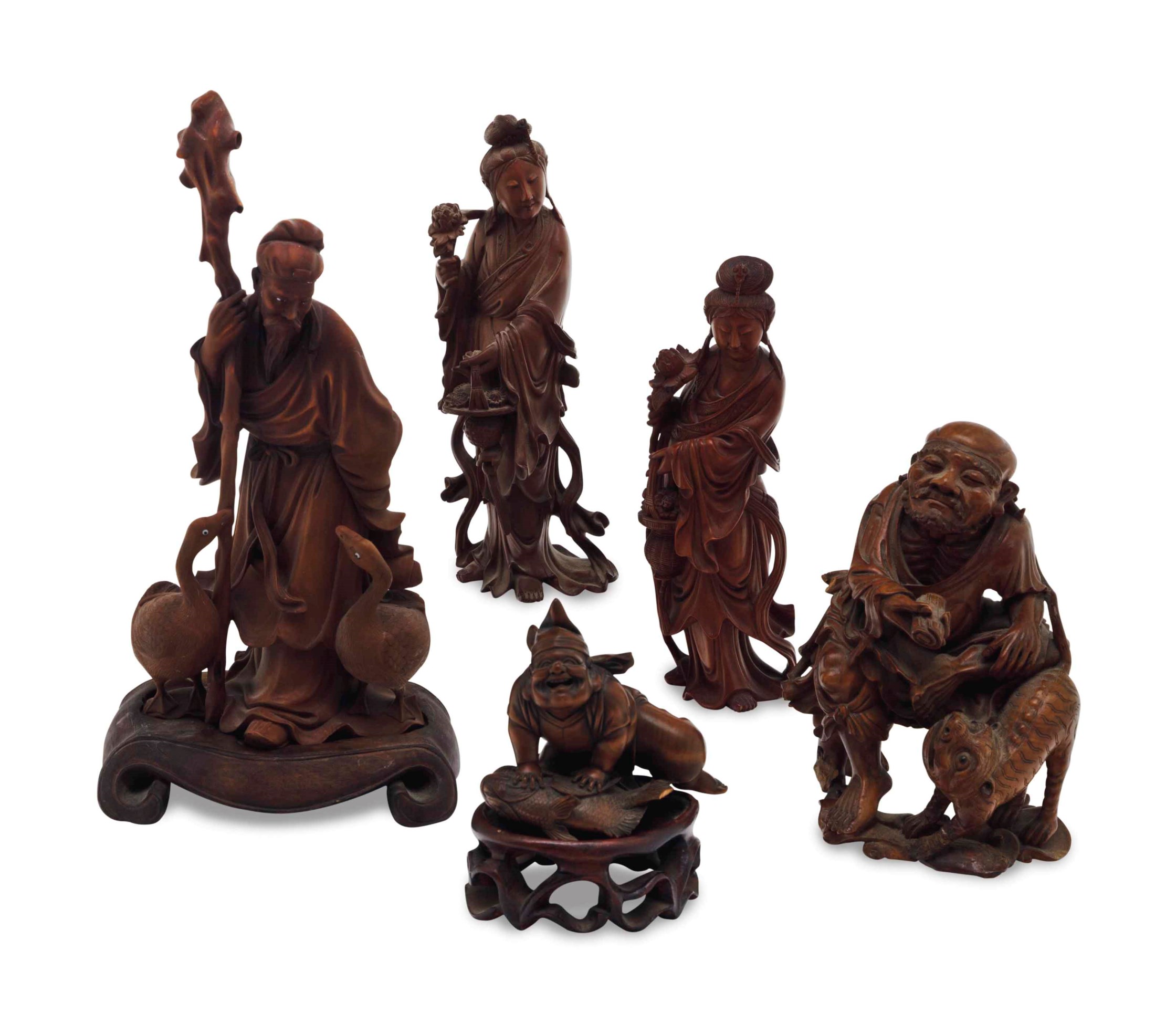 FOUR CHINESE CARVED WOOD FIGURES, Christie's