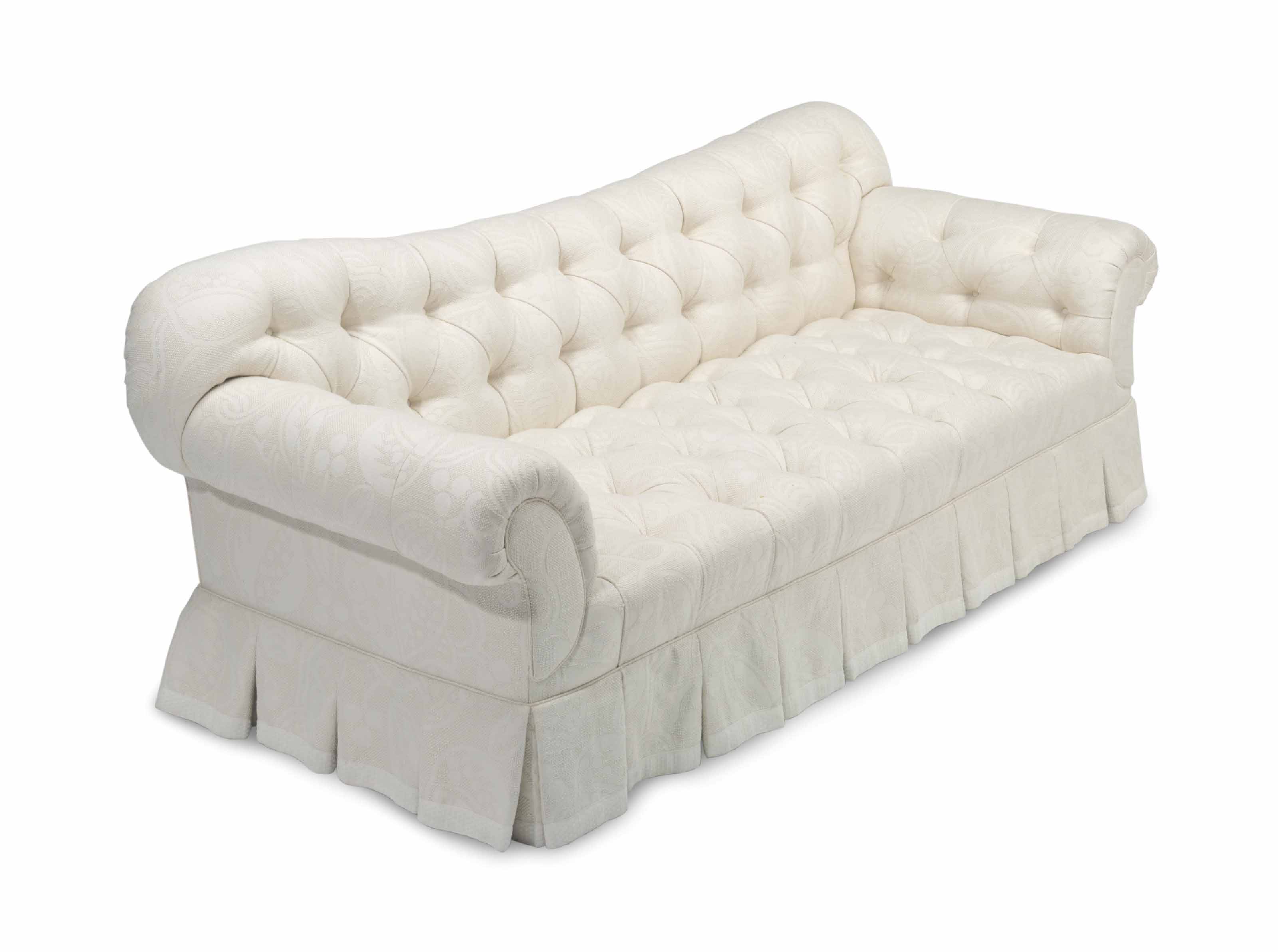 A Cream Upholstered Button Tufted Sofa With its sheltering arms and deeply tufted upholstery, the chesterfield collection is synonymous with comfort. christie s