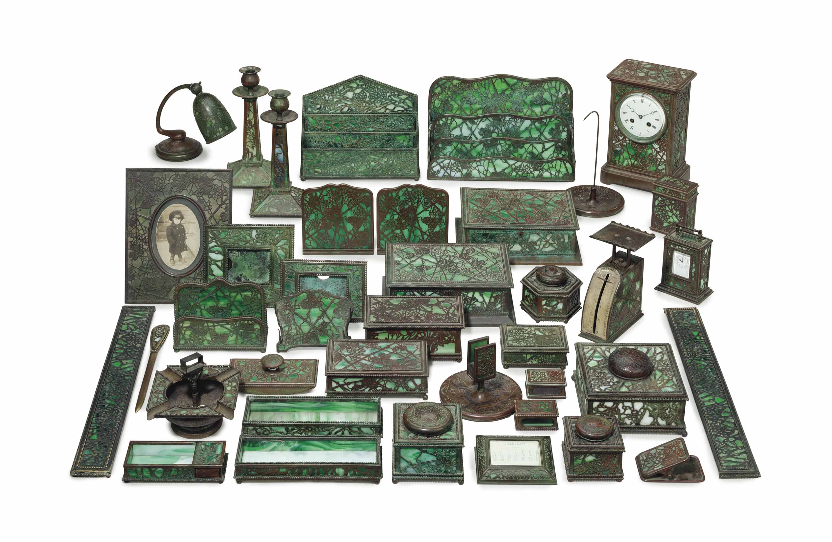 AN AMERICAN PATINATED BRONZE AND FAVRILE GLASS DESK SET BY TIFFANY STUDIOS Christie s