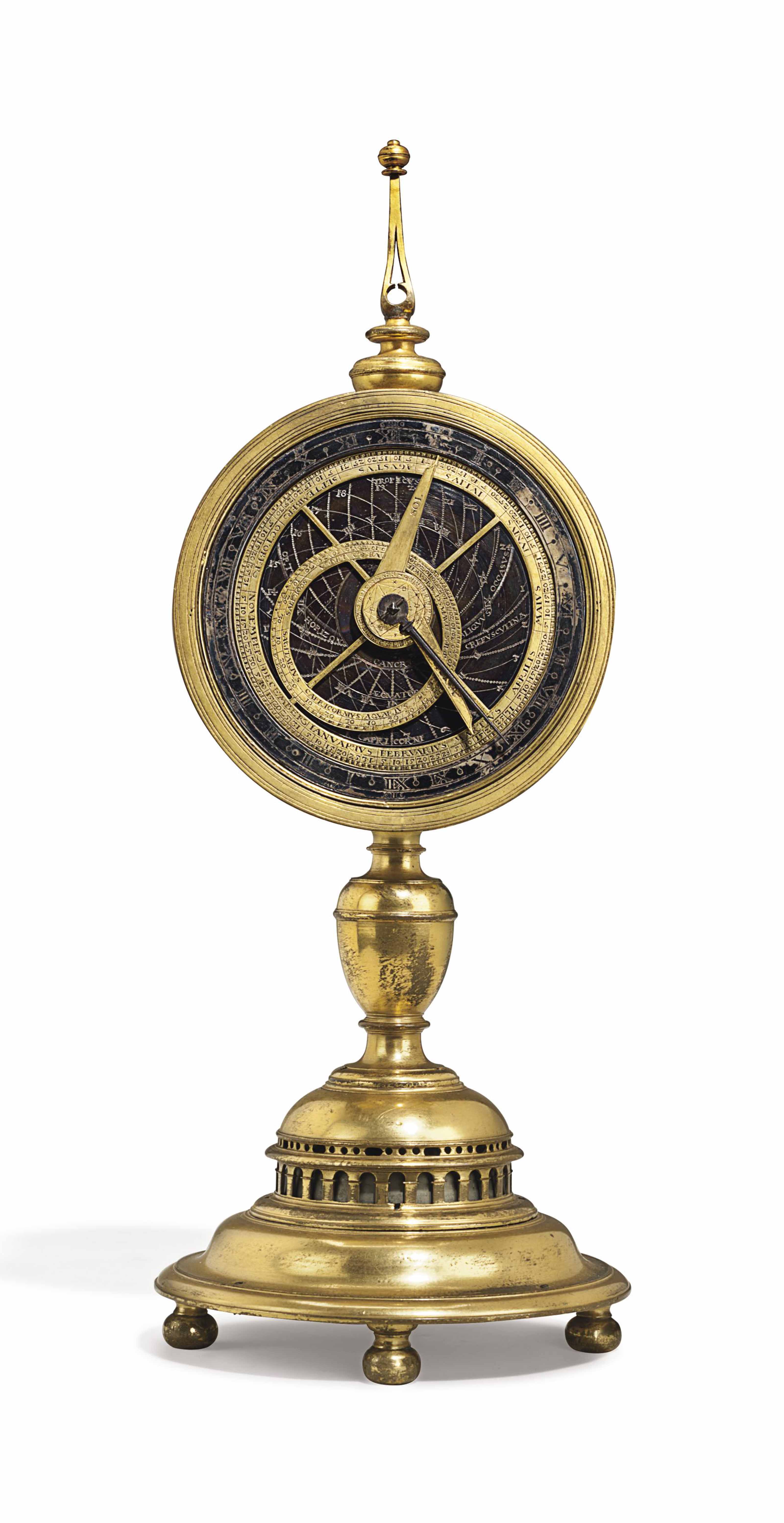 A GERMAN GILTBRASS STRIKING AND ASTRONOMICAL 'MONSTRANCE' TABLE CLOCK , NIKOLAUS SCHMIDT