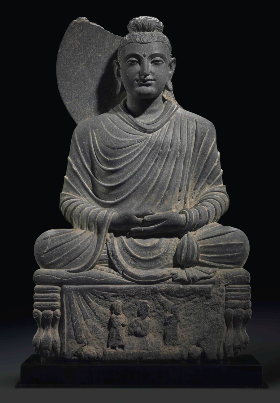 A GRAY SCHIST FIGURE OF A SEATED BUDDHA, GANDHARA, 2ND/3RD CENTURY ...