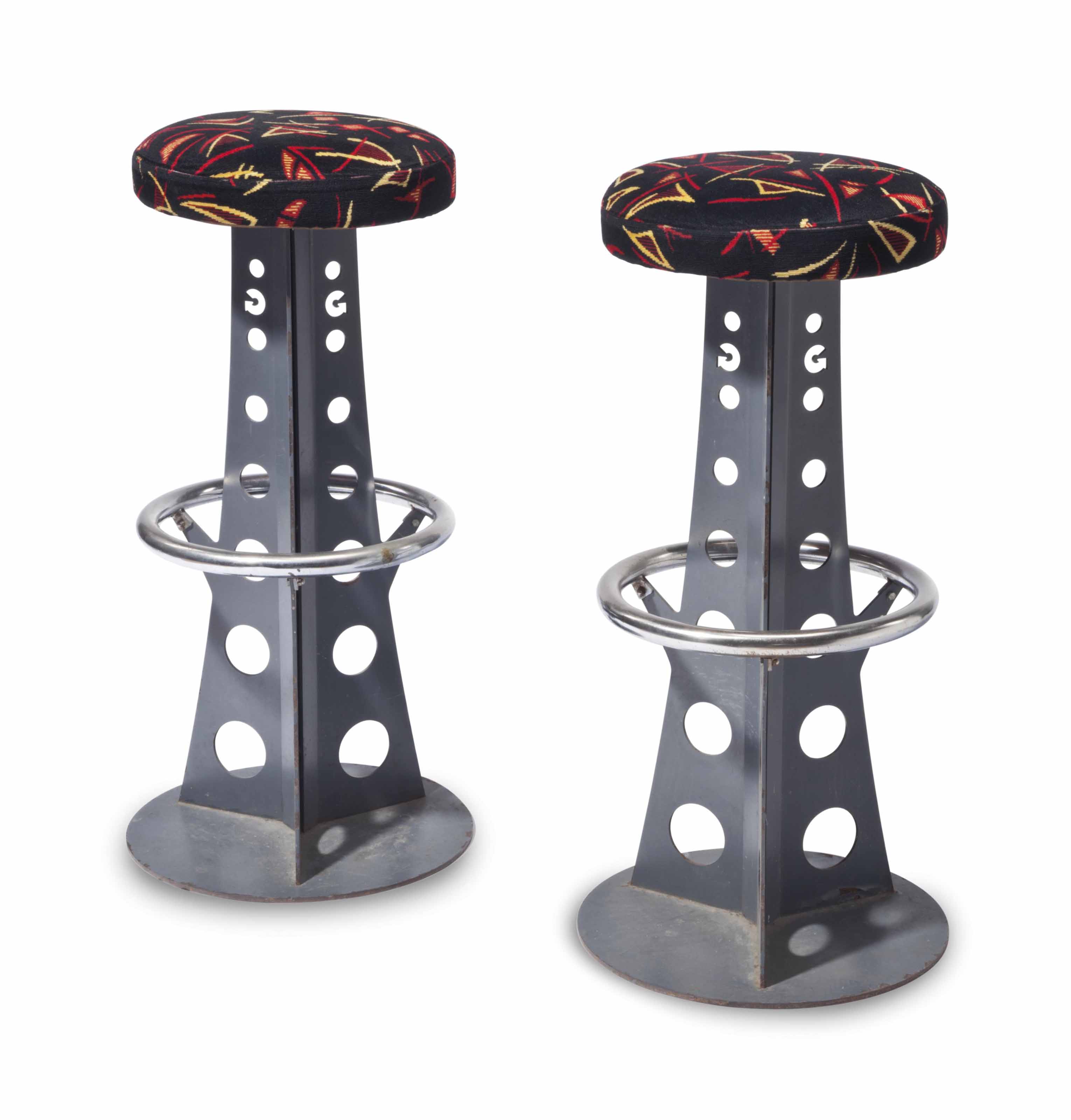 A GROUP OF THREE ART DECO STYLE STEEL AND CHROMED METAL BAR STOOLS