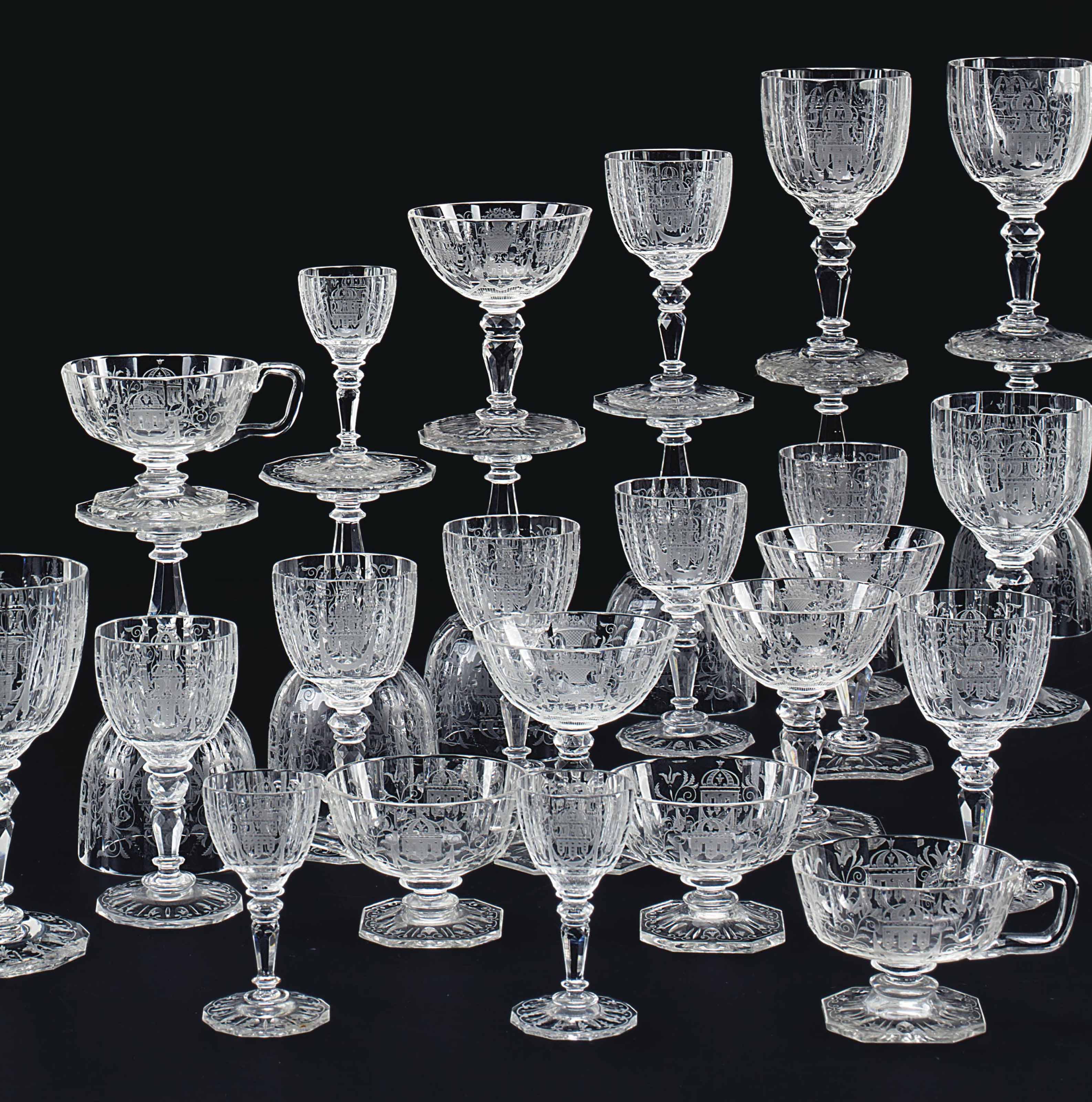 A LOBMEYR ENGRAVED GLASS PART STEMWARE SERVICE , LATE 19TH CENTURY