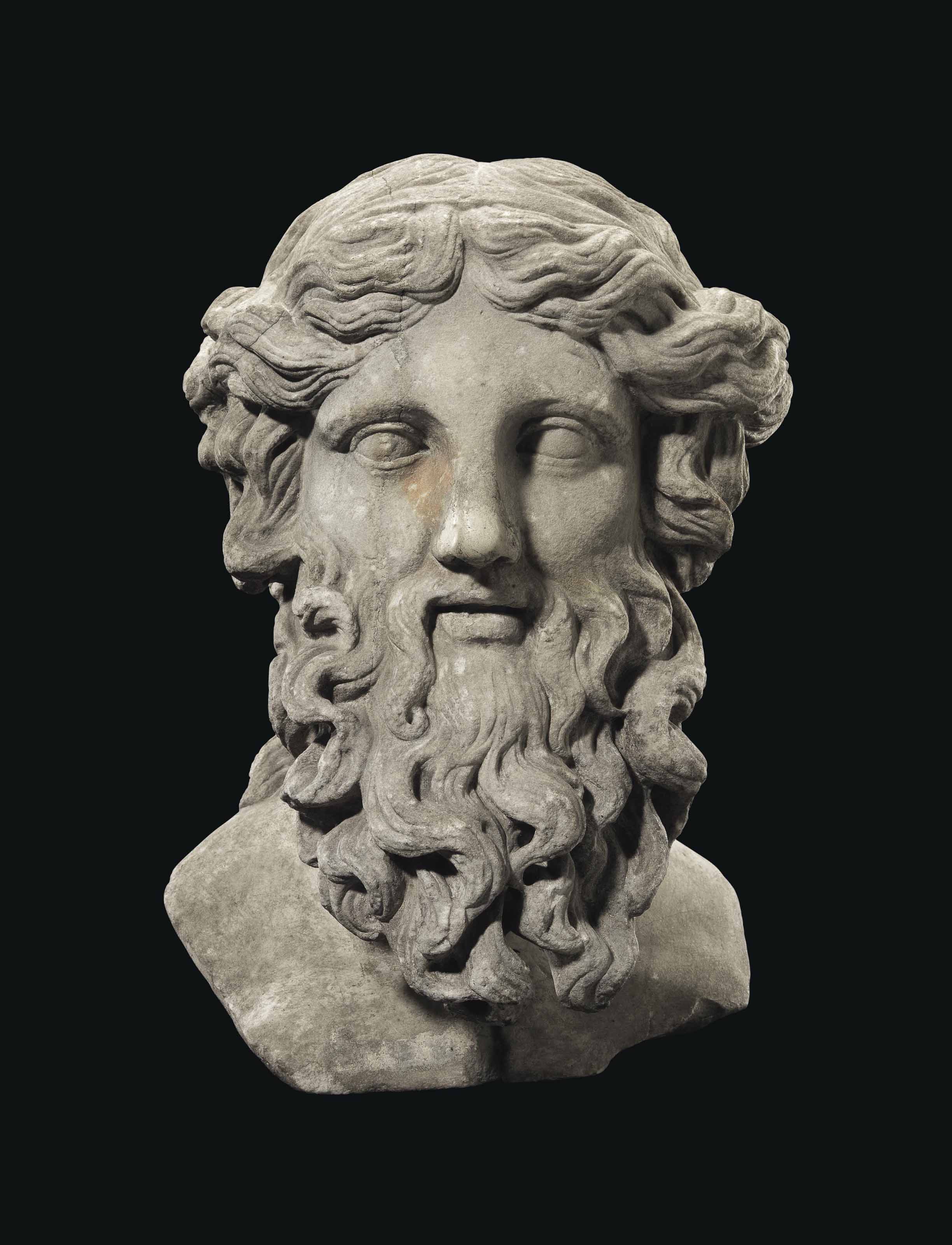 A ROMAN MARBLE BUST OF A BEARDED DEITY , CIRCA LATE 1STEARLY 2ND