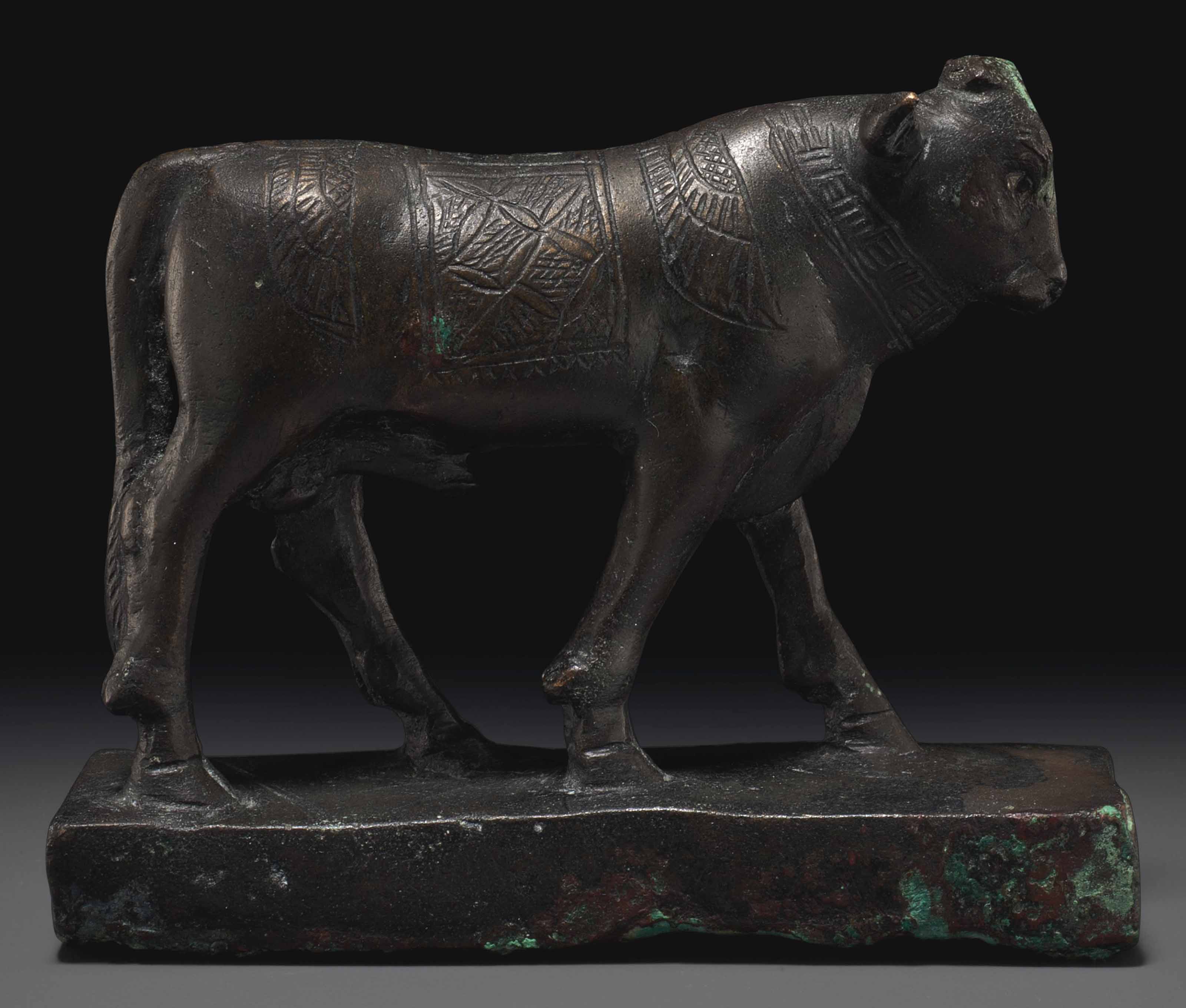 AN EGYPTIAN BRONZE APIS BULL