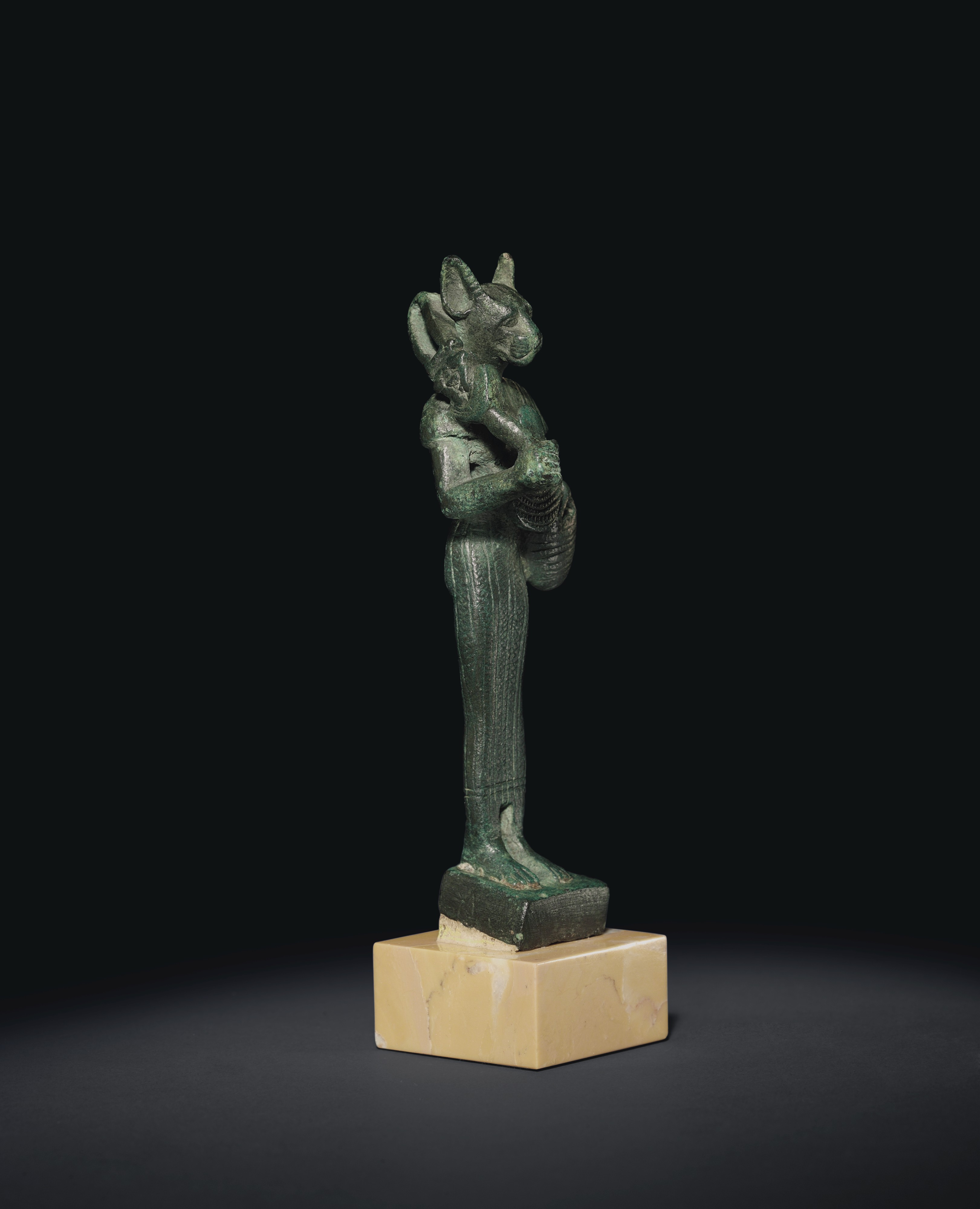 AN EGYPTIAN BRONZE BASTET , LATE PERIOD TO PTOLEMAIC PERIOD, 664-30 B.C