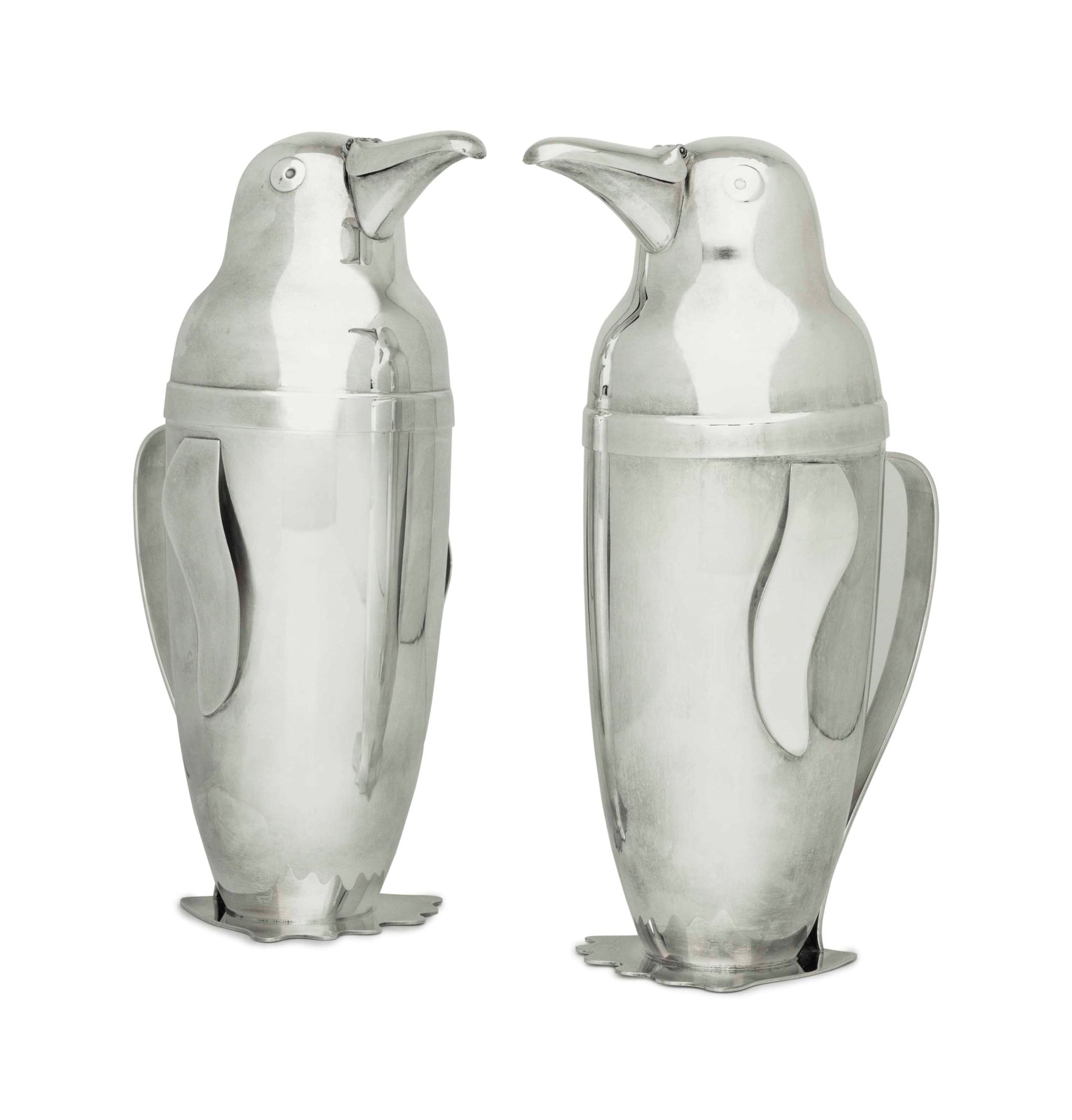 A PAIR OF AMERICAN SILVER PLATE PENGUINFORM COCKTAIL SHAKERS, MARK OF
