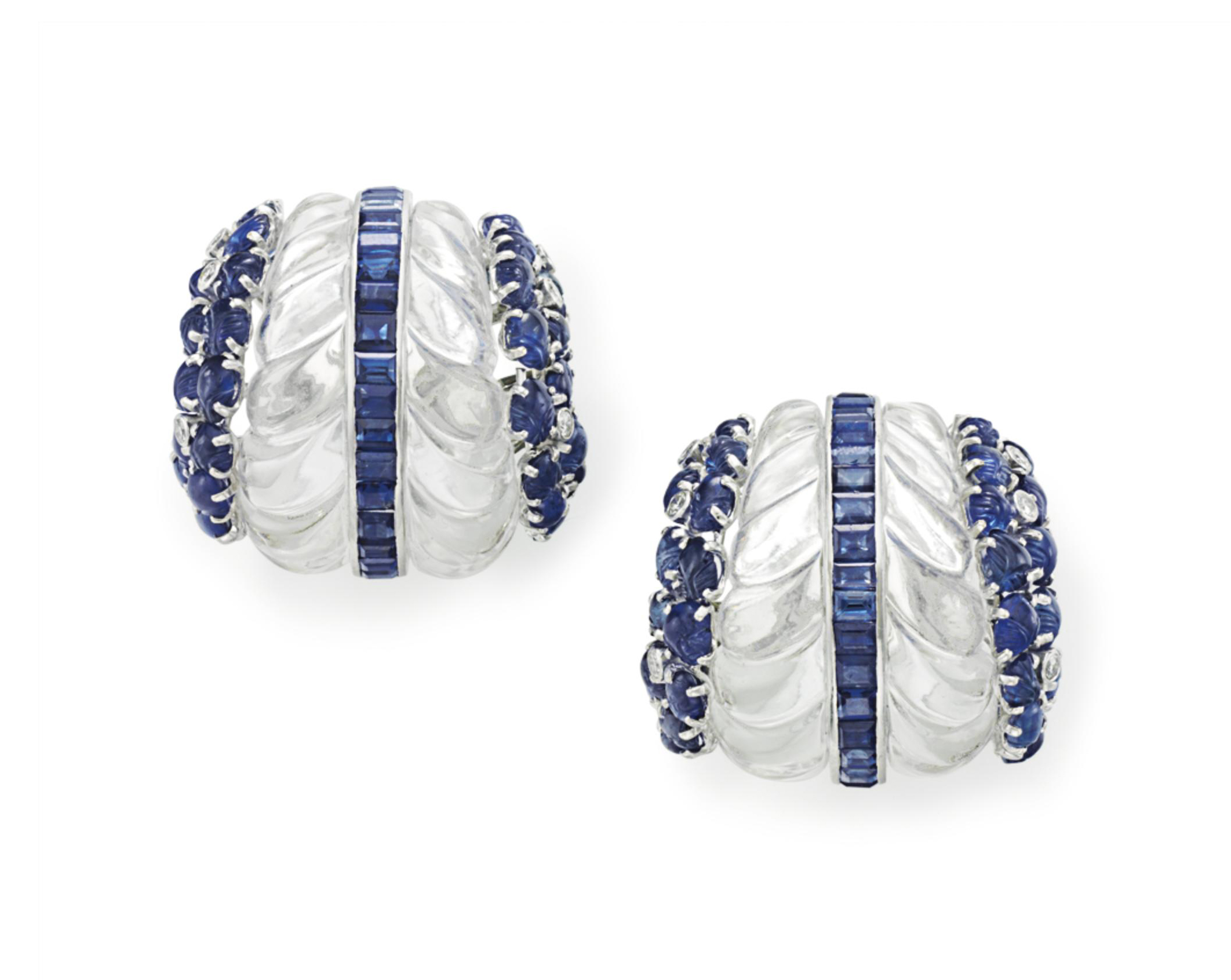 A pair of rock crystal, sapphire and diamond ear clips, by David Webb. Sold for $25,000 on 20 October 2015 at Christie&rsquo;s in New York