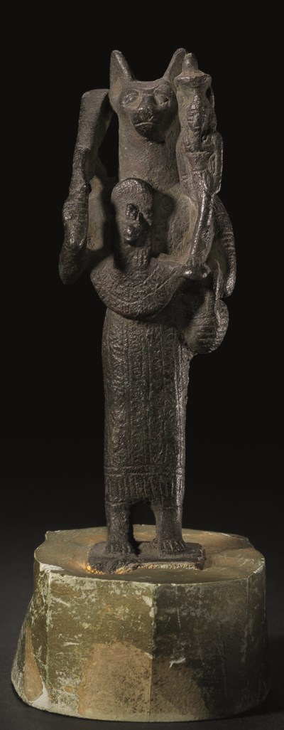 AN EGYPTIAN BRONZE BASTET , LATE PERIOD TO PTOLEMAIC PERIOD, 664-30 B.C