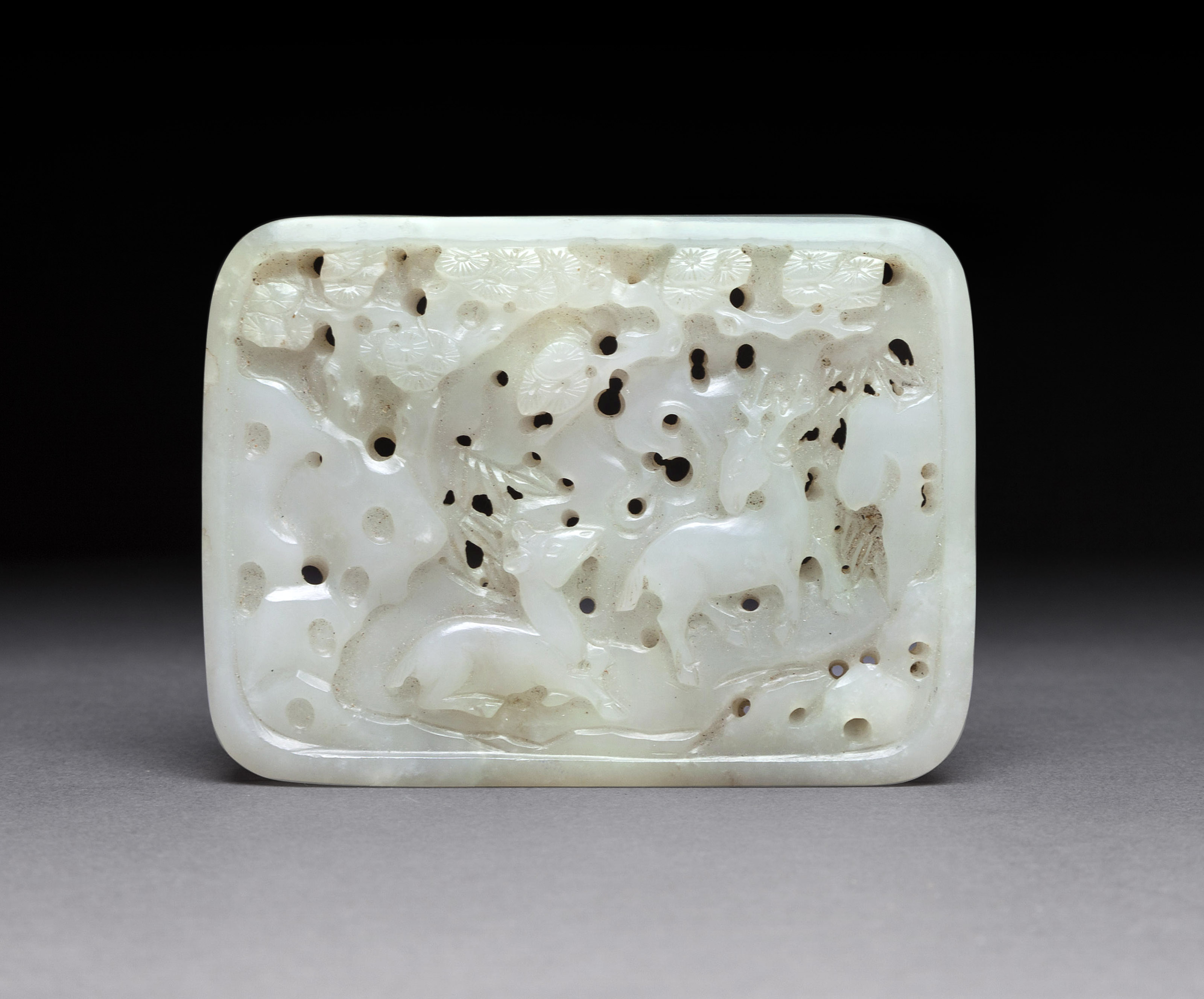 A white jade 'dragon' pendant, Qing dynasty, 19th century