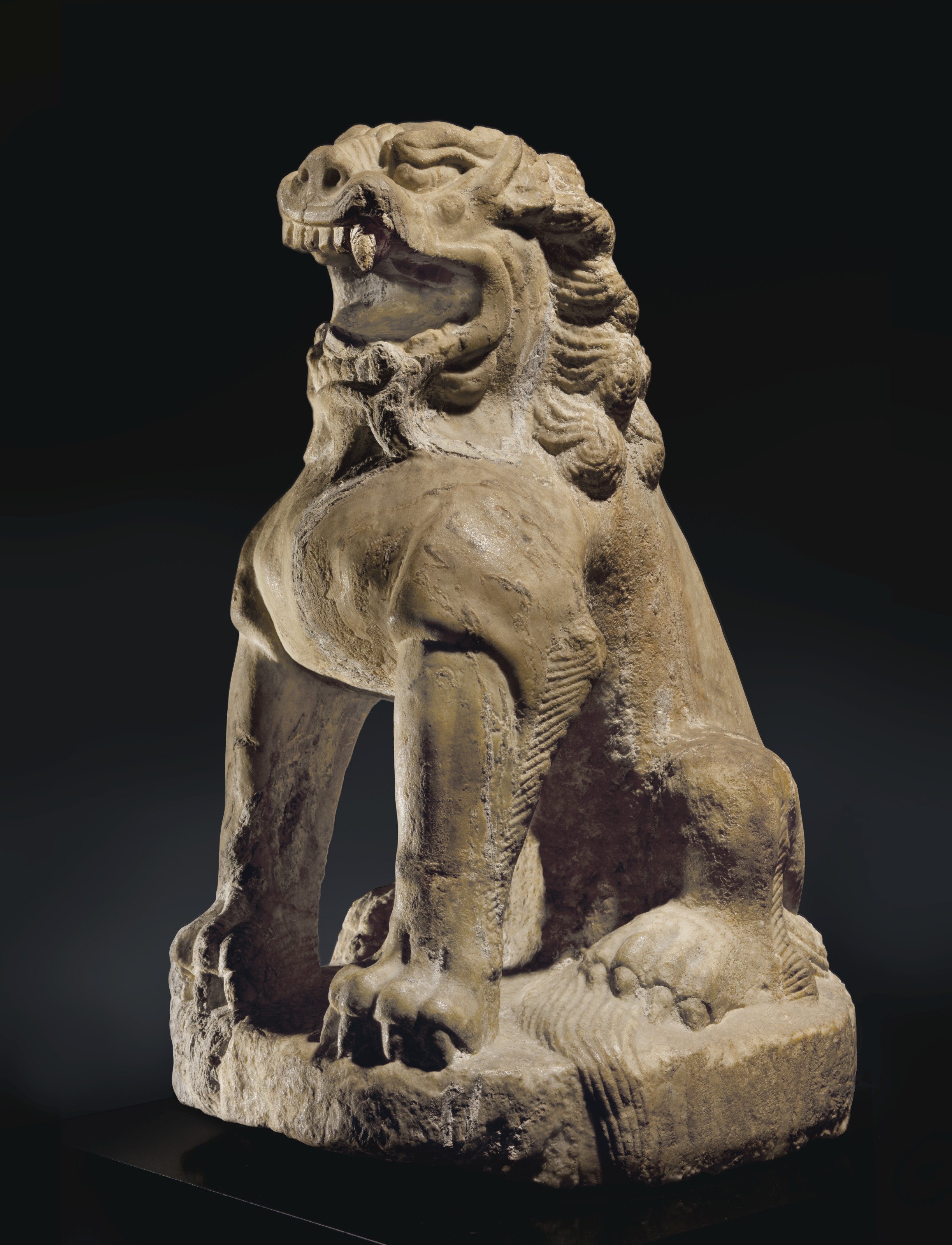 A LARGE MARBLE FIGURE OF A SEATED LION , CHINA, TANG DYNASTY (AD 618