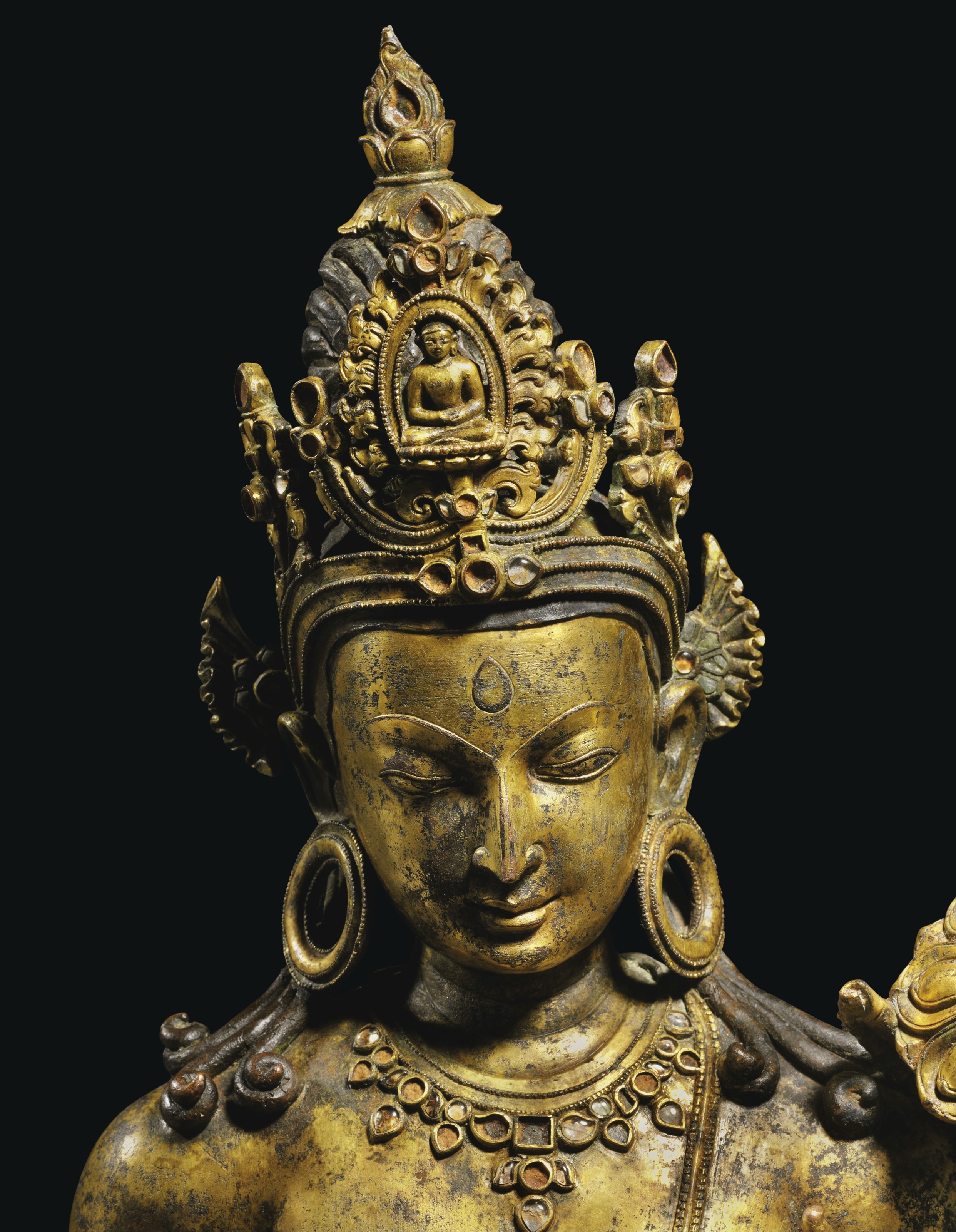A LARGE AND IMPORTANT GILT BRONZE FIGURE OF AVALOKITESHVARA , NEPAL