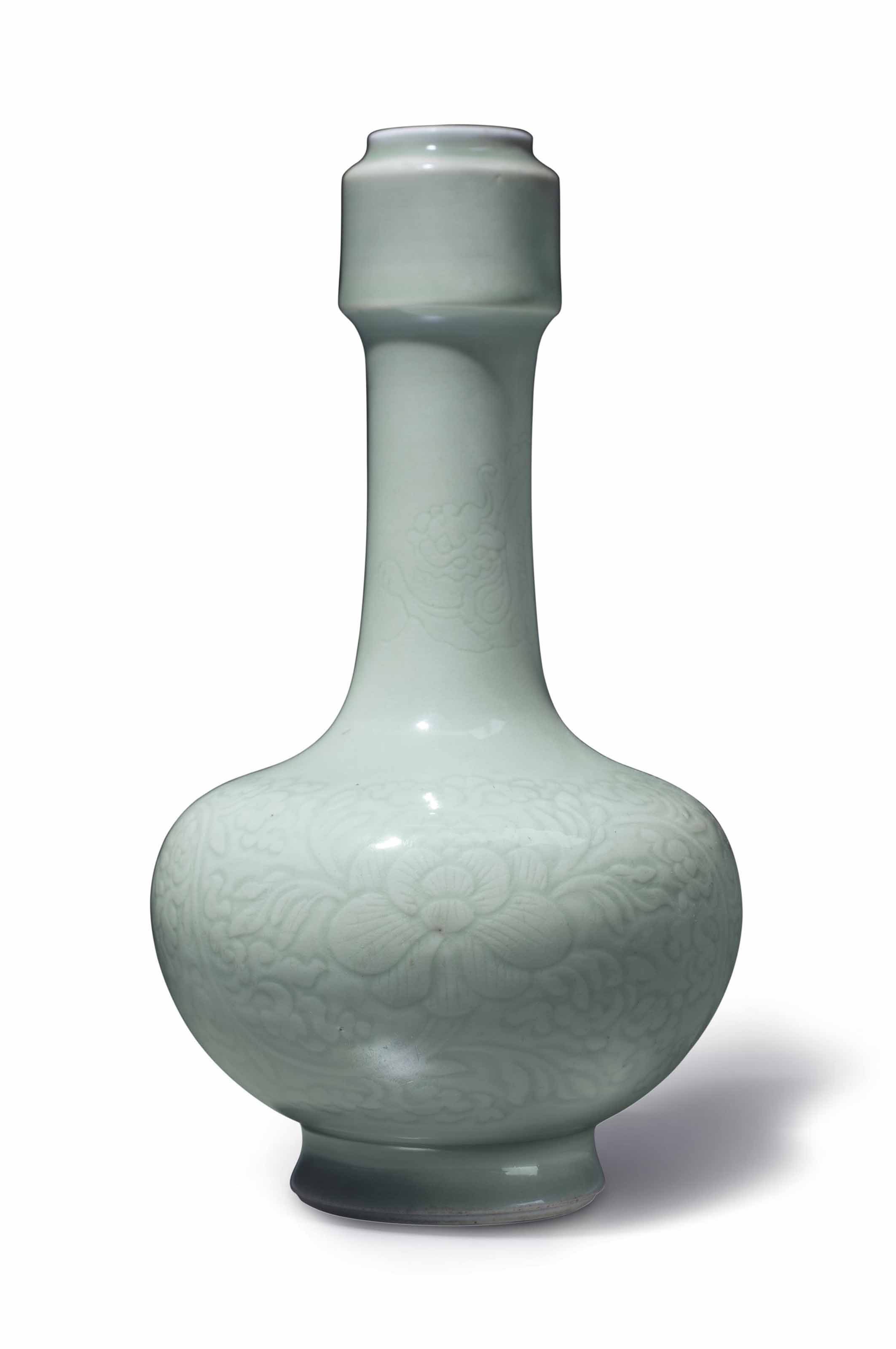 A CELADON-GLAZED CARVED DOMED WATER POT, CHINA, QING DYNASTY, 18TH