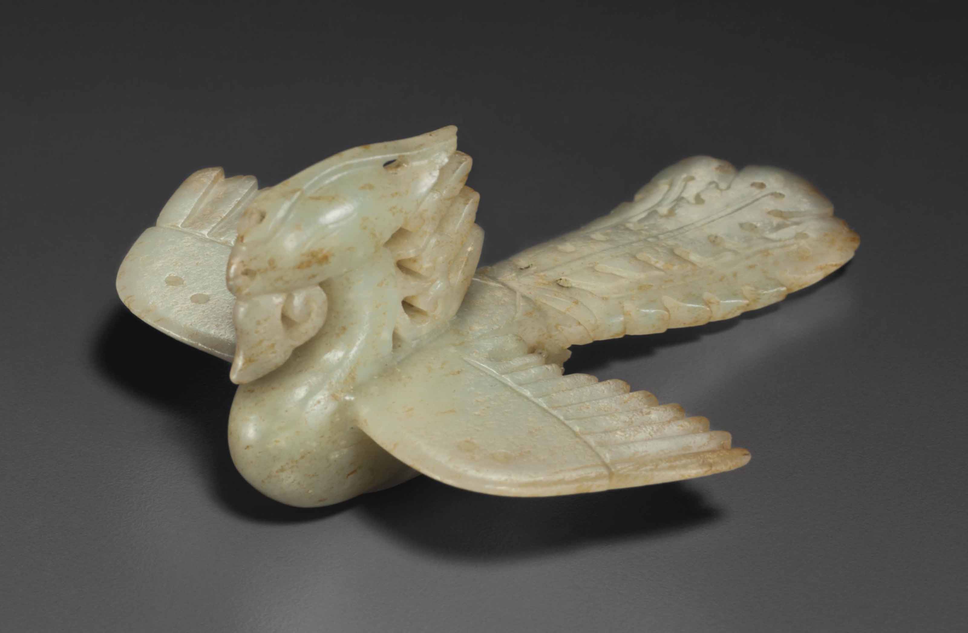 A GREENISHWHITE JADE PHOENIXFORM HAIR OR HEADDRESS ORNAMENT , CHINA
