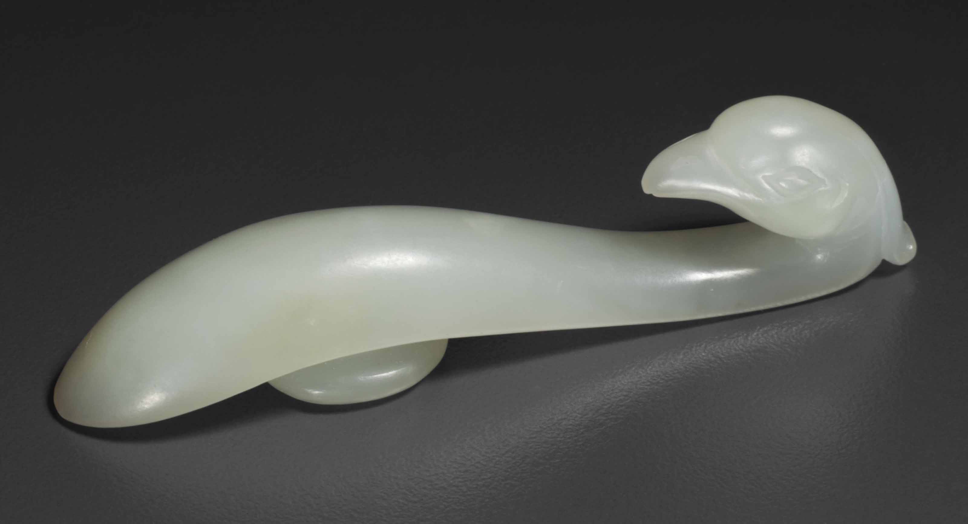 A SMALL WHITE JADE BELT HOOK , CHINA, QING DYNASTY OR EARLIER Christie's