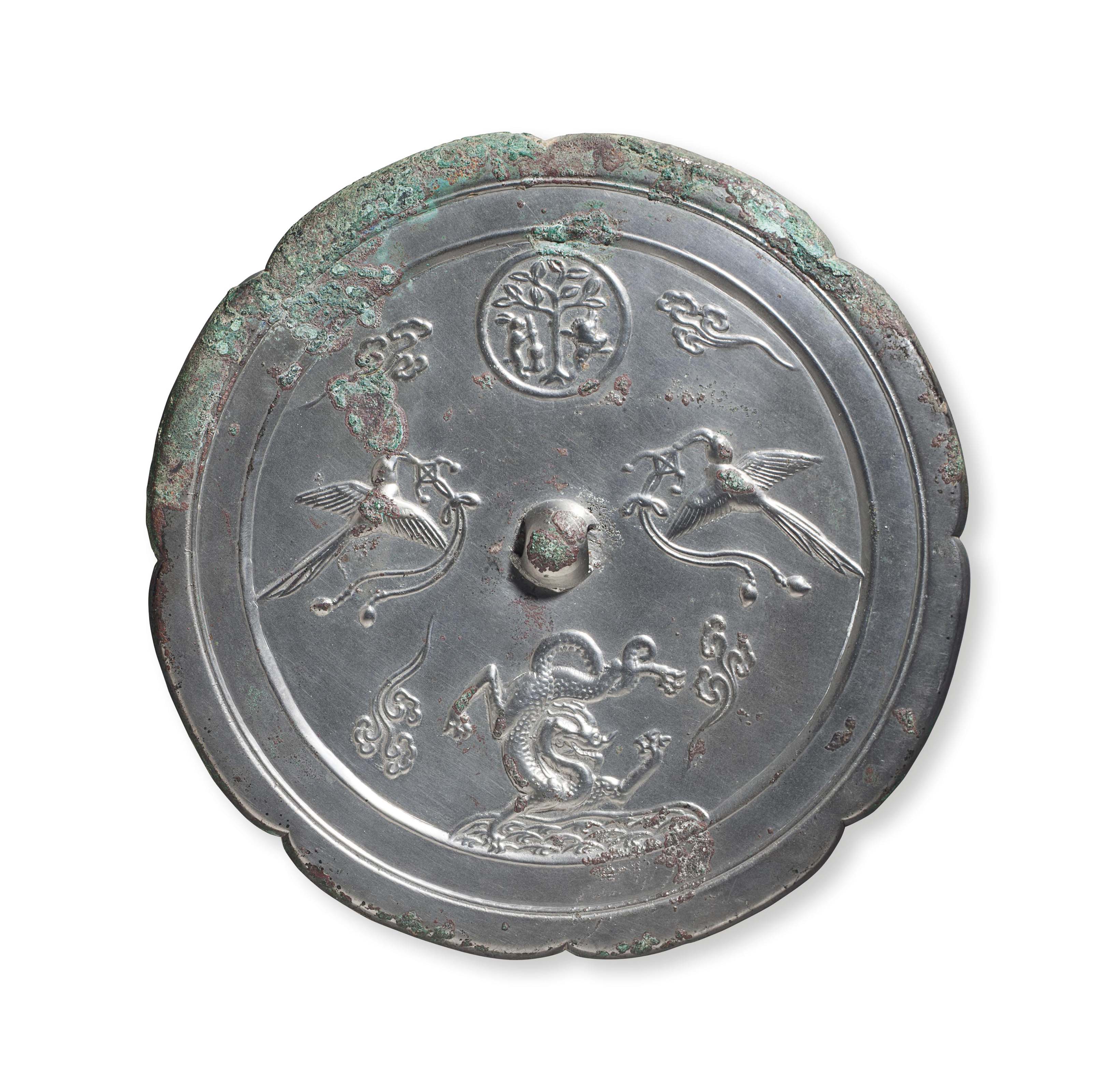 Image result for A silvery bronze octalobed mirror, China, Tang dynasty (AD 618-907)