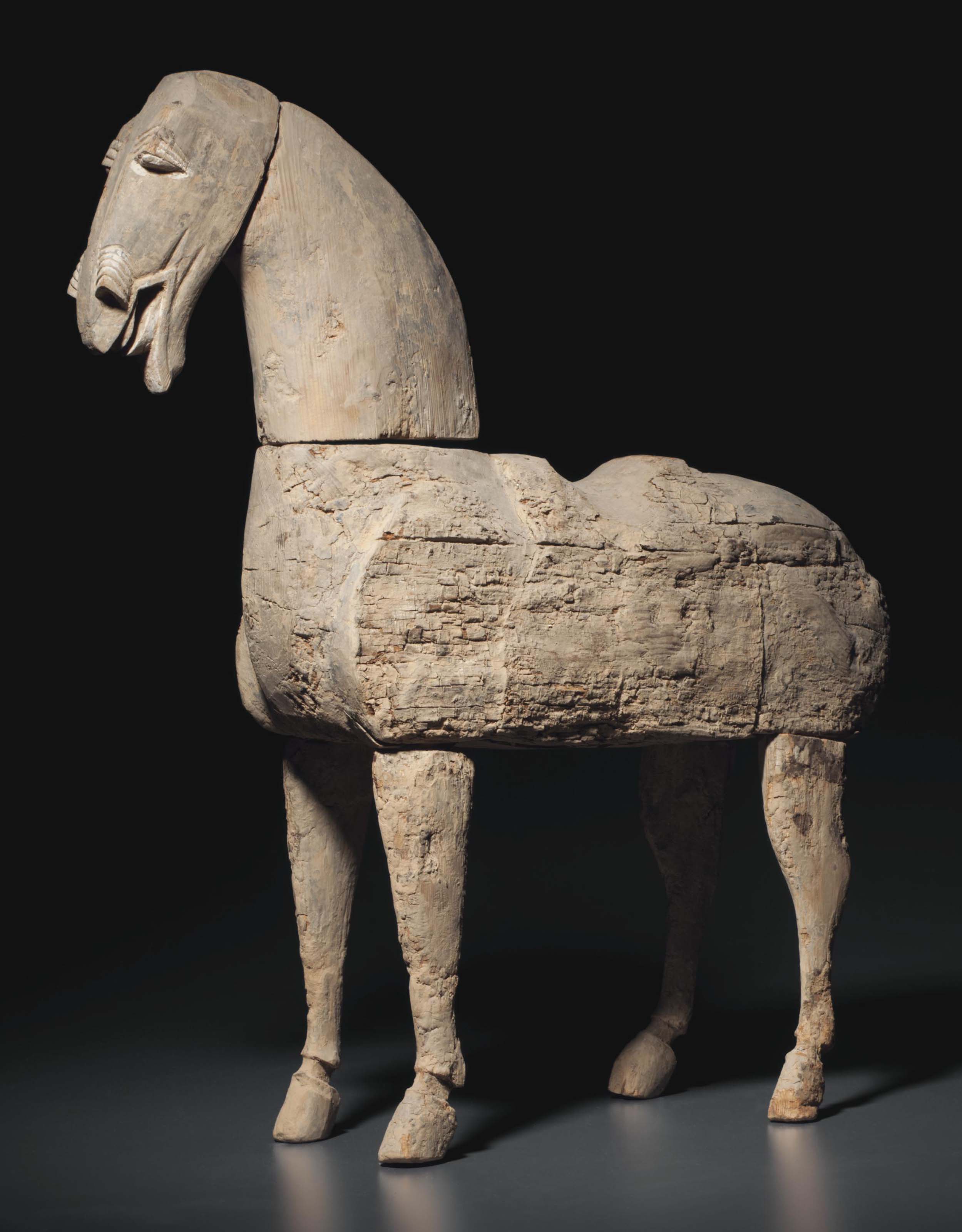 A LARGE WOOD FIGURE OF A HORSE , CHINA, HAN DYNASTY (206 BCAD 220