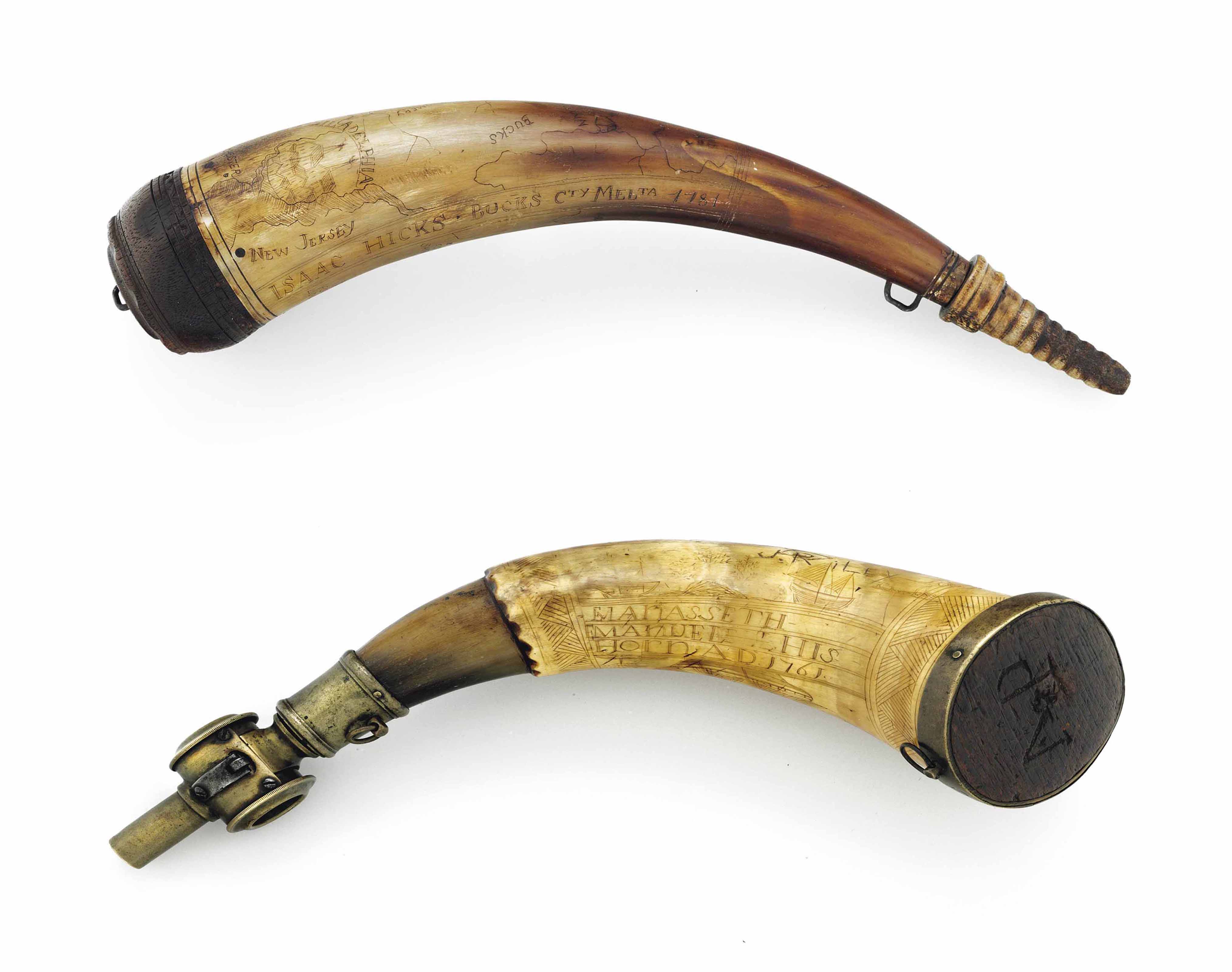 POWDER HORN. An engraved powder horn, with brass cast fittings