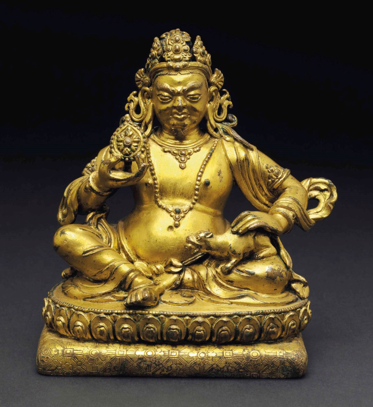 A GILT BRONZE FIGURE OF A YAKSHA GENERAL, TIBET, 15TH/16TH CENTURY