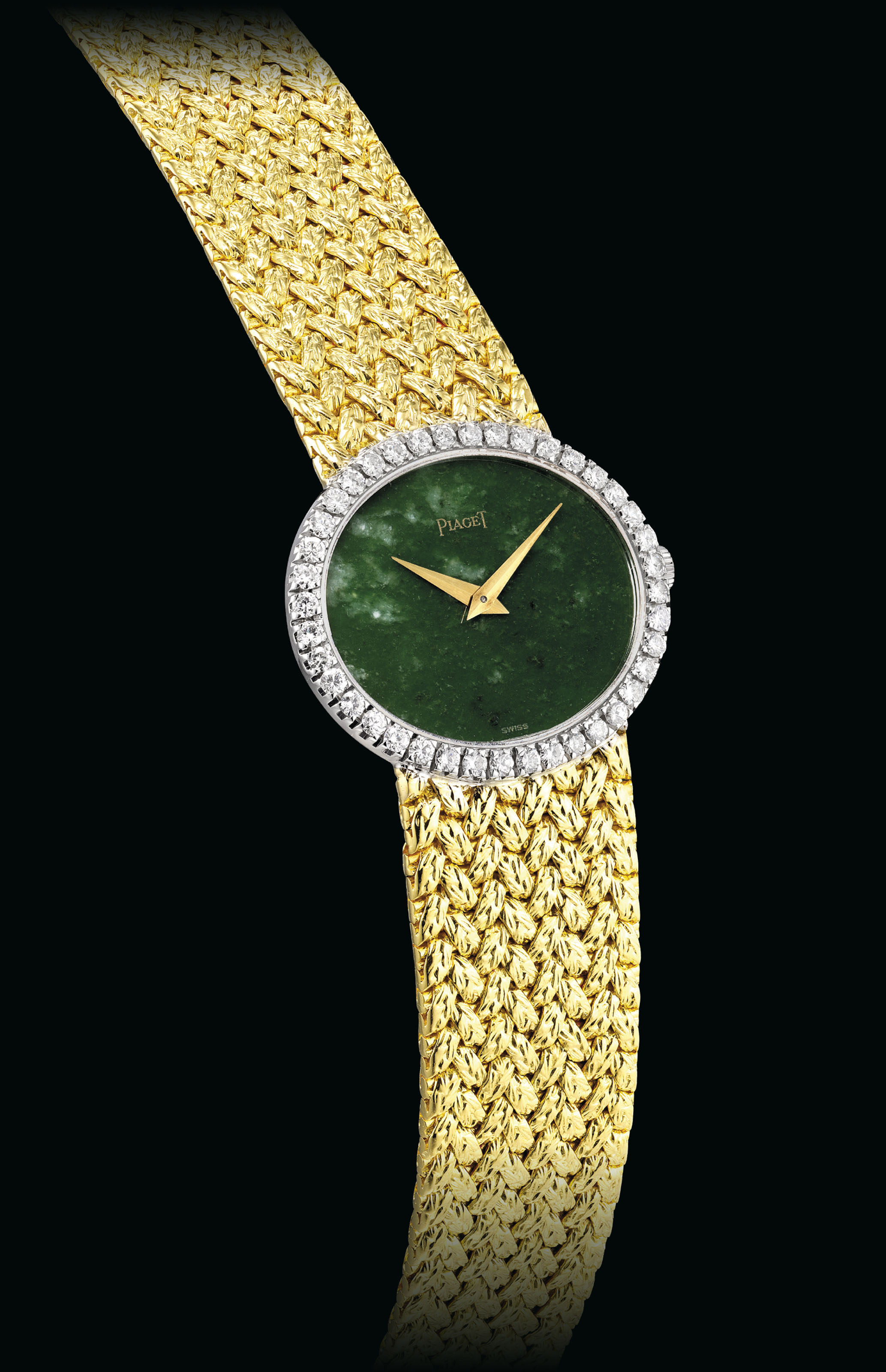 PIAGET. A LADY'S 18K GOLD AND DIAMONDSET OVAL BRACELET WATCH WITH JADE
