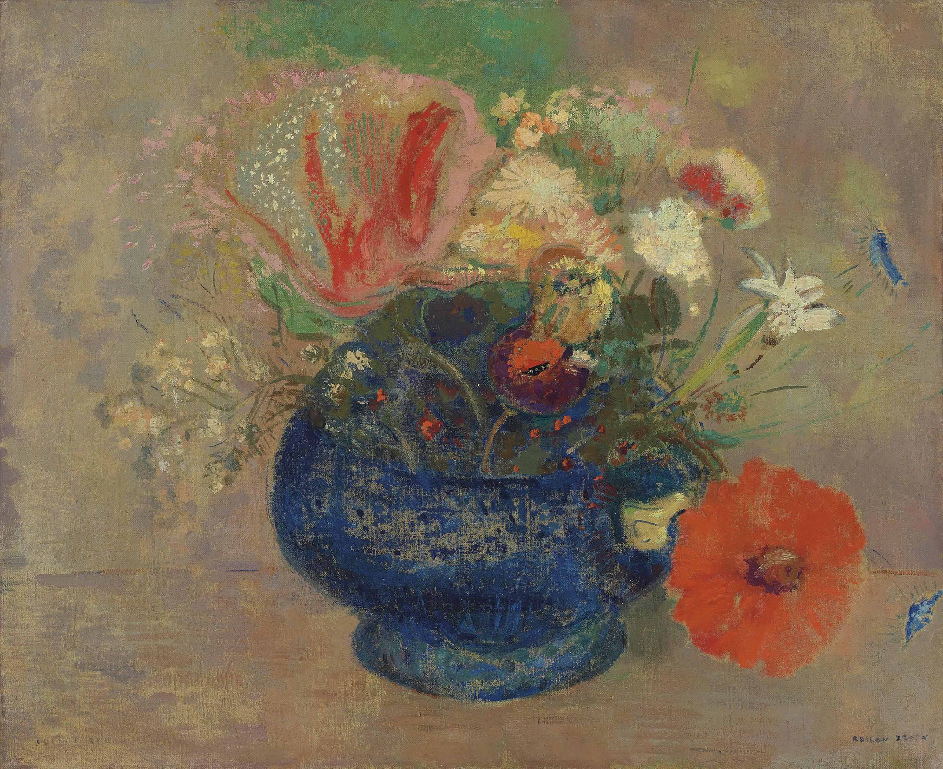 Fleurs dans une coupe bleue