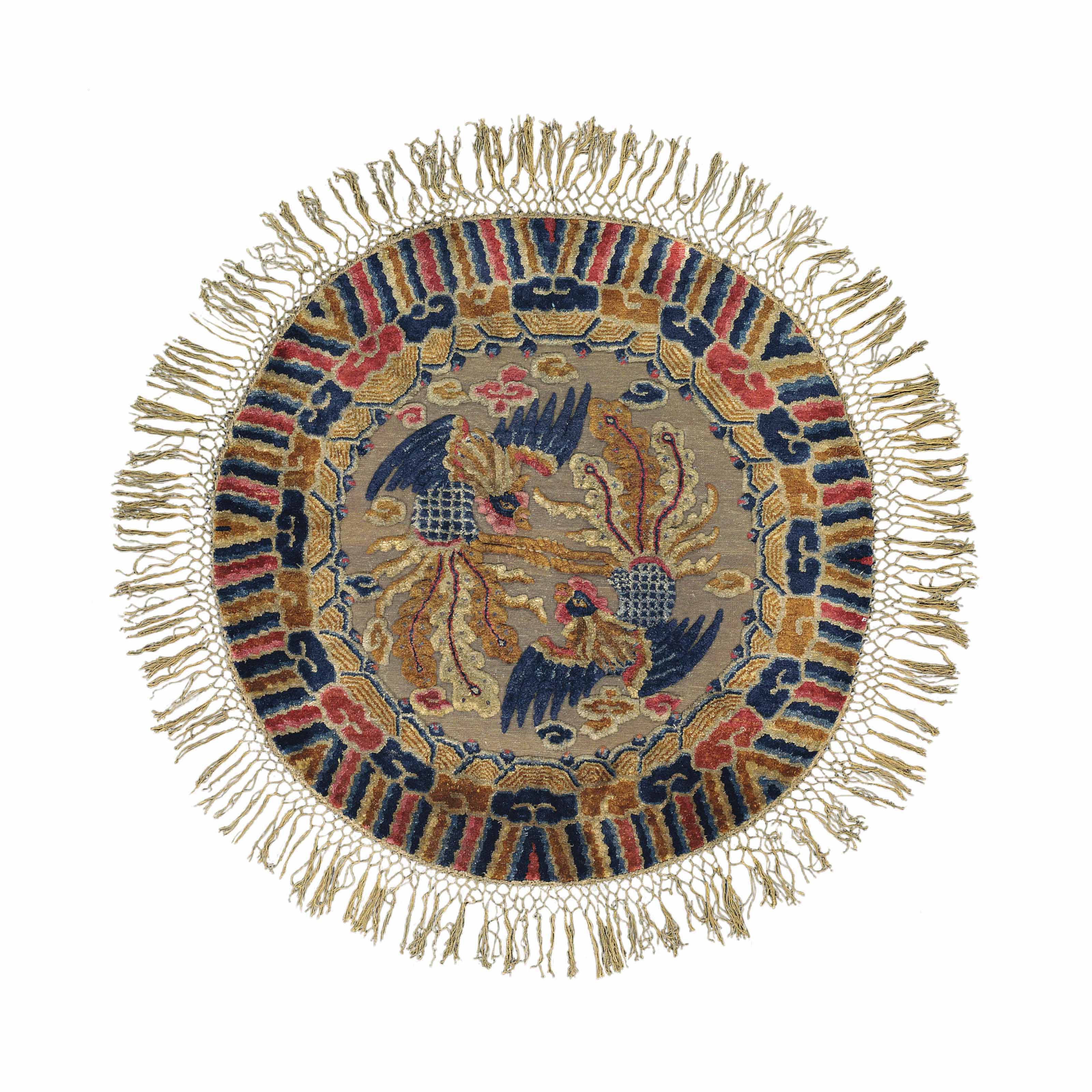 A SILK AND METALTHREAD CIRCULAR CHINESE RUG , CIRCA 1900 Christie's