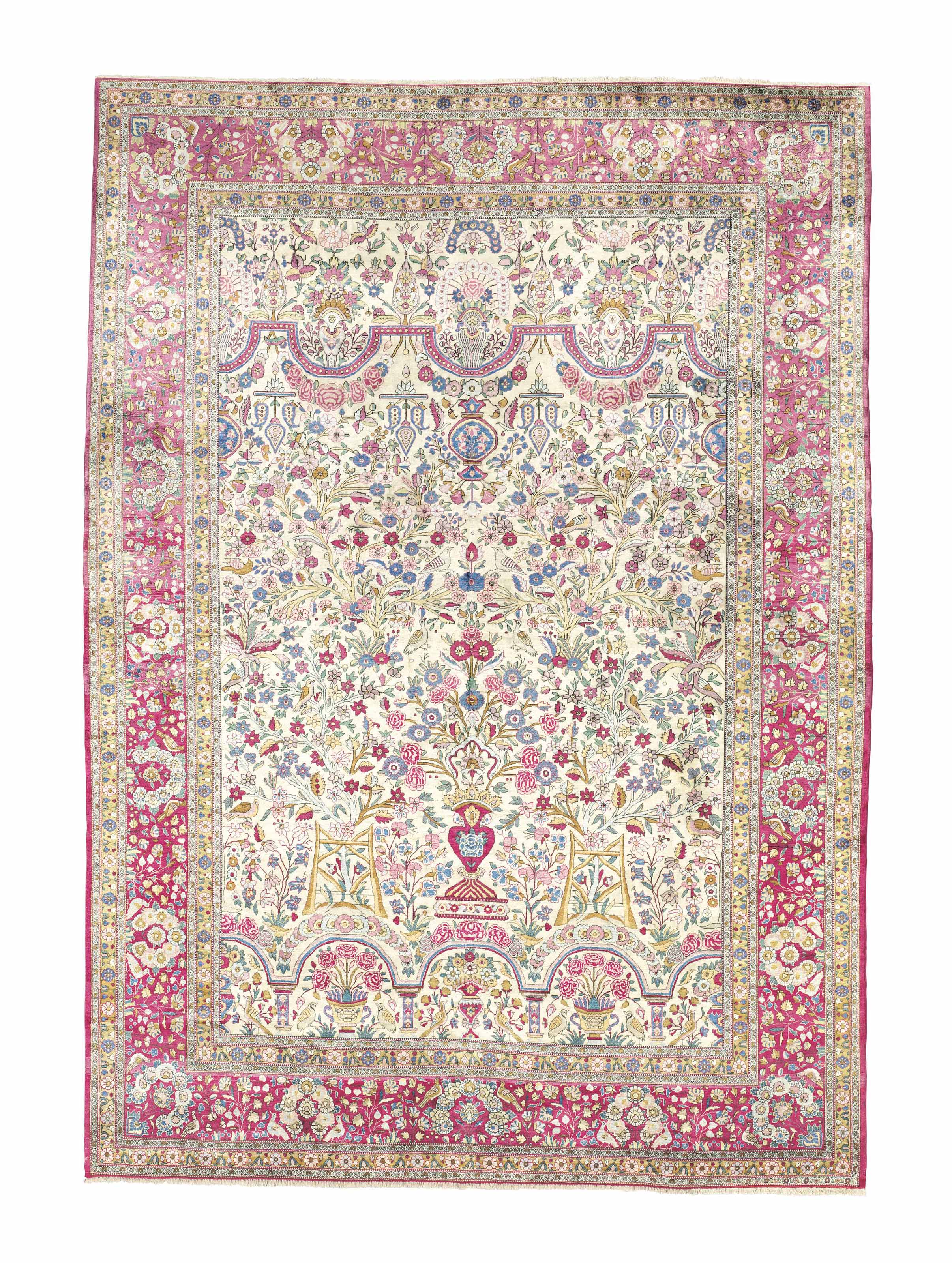 A SILK KASHAN CARPET