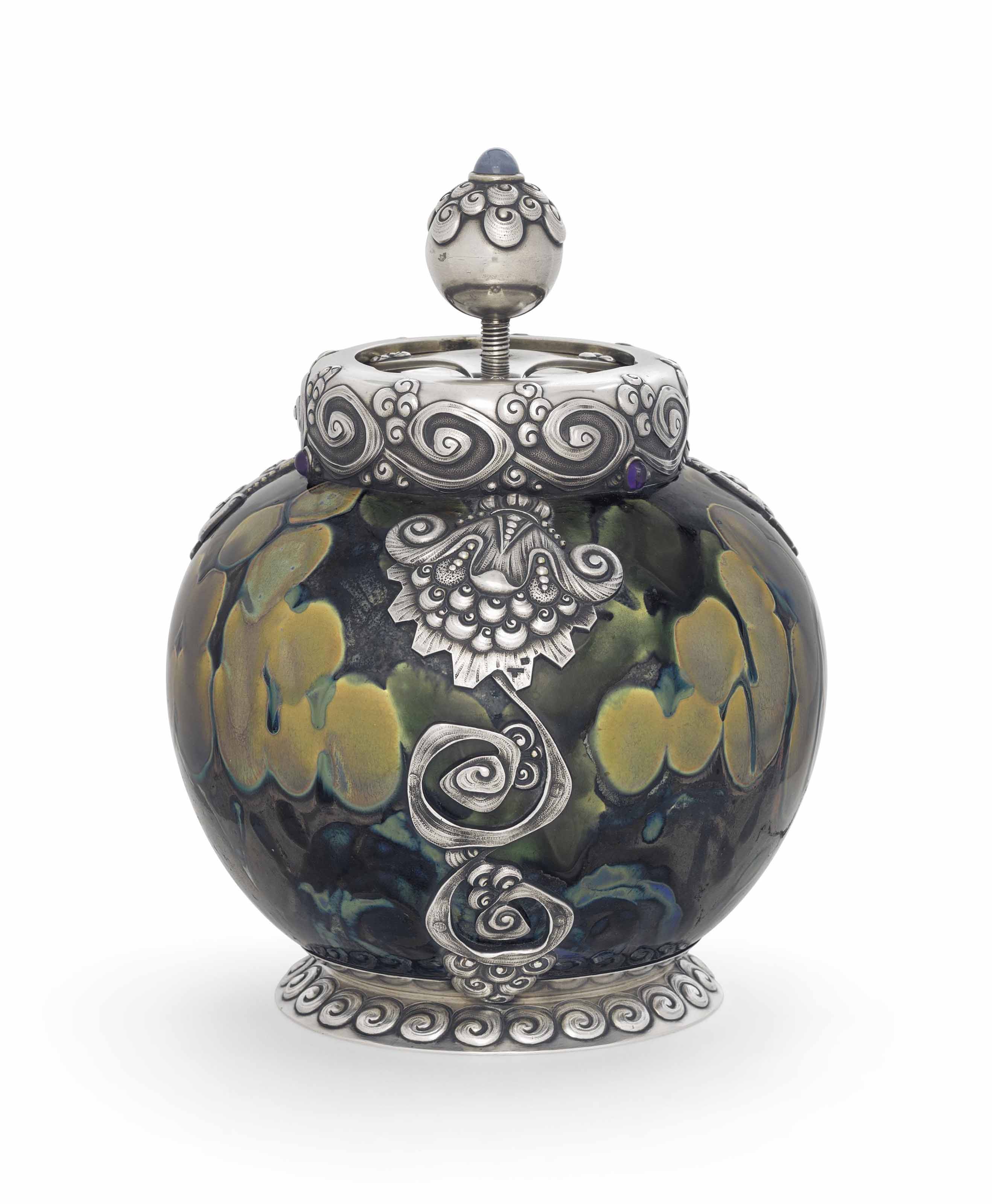 A gem-set parcel-gilt silver-mounted ceramic tobacco humidor, Moscow, 1899-1908. Sold for &pound;134,500 on 6 June 2016 at Christie&rsquo;s London