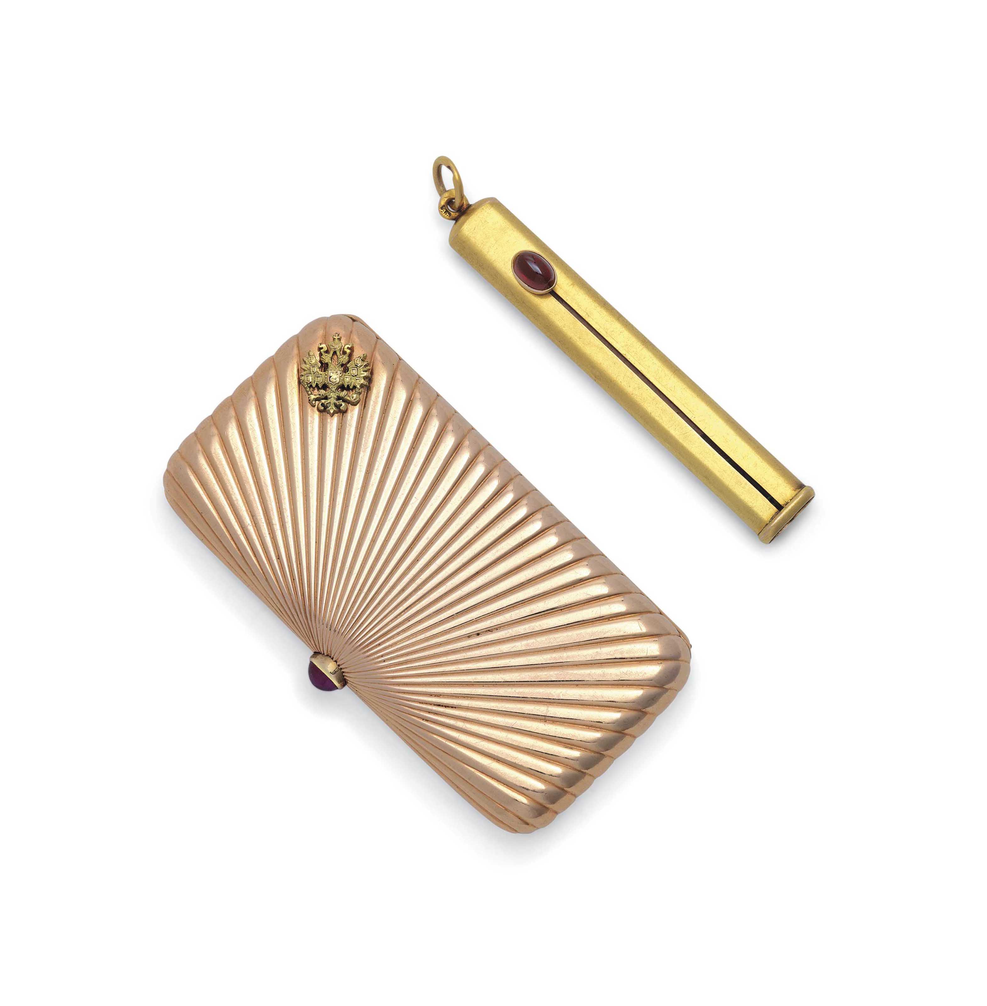 A GEMSET TWOCOLOUR GOLD VESTA CASE AND A GOLD PENCIL HOLDER , THE
